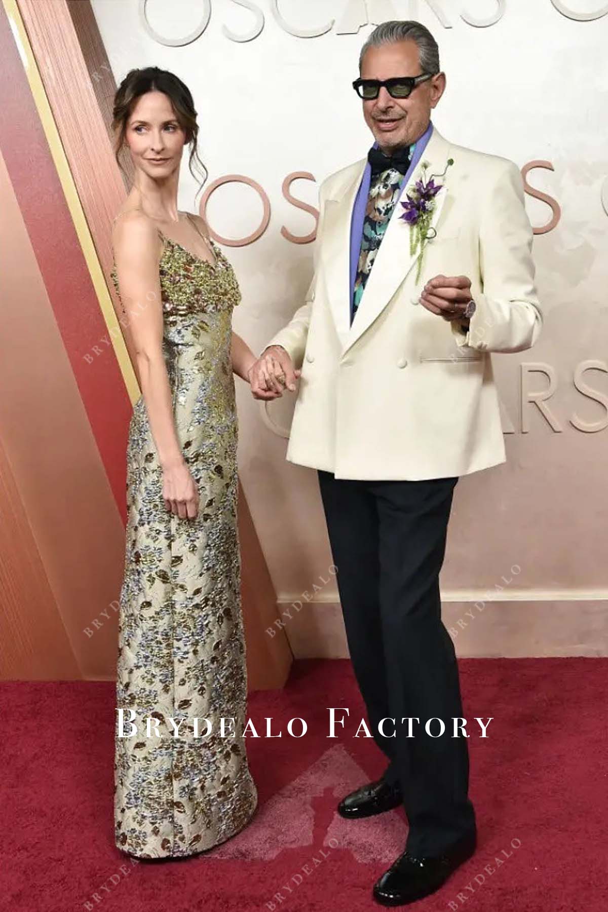 2025 Oscars red carpet Emilie Livingston crystals taupe column dress