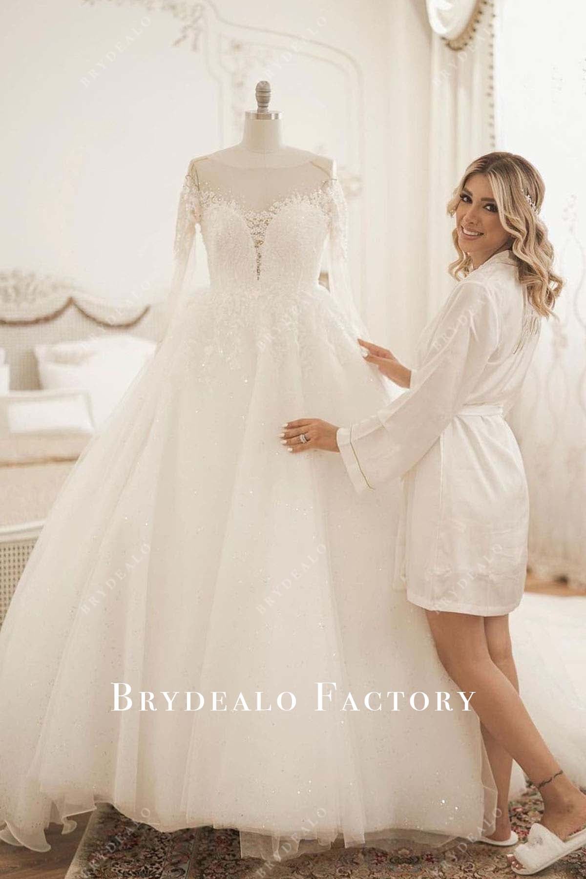 A-Line White Wedding Gown with a Cascading Train for a Majestic Bridal Look
