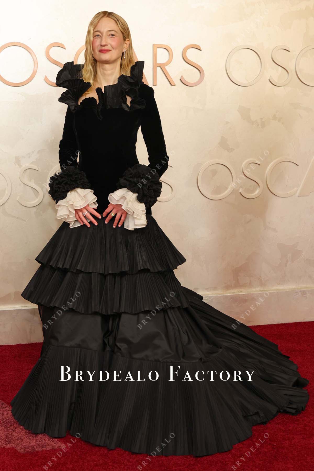 Alba Rohrwacher 2025 Oscars red carpet ruffles neckline formal dress