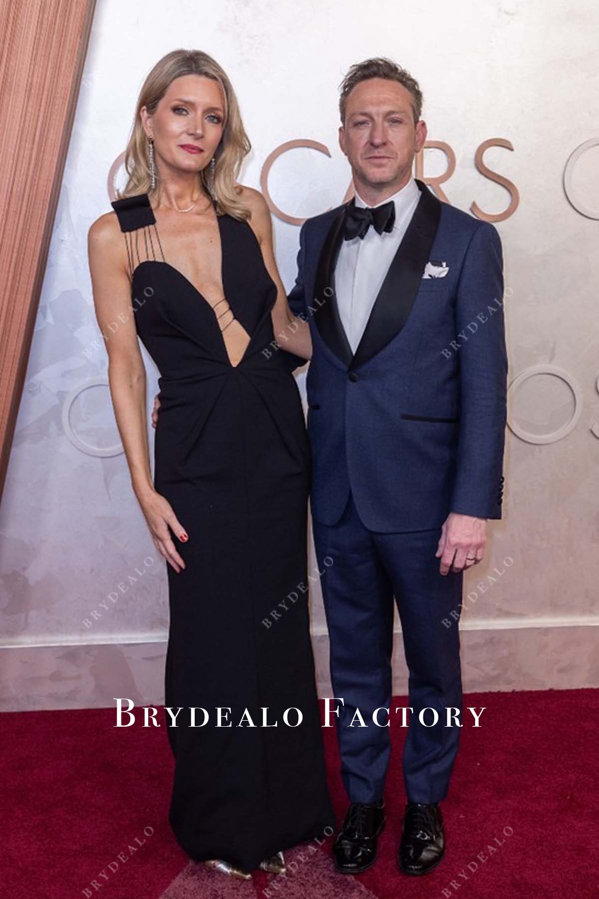 Annie Marter black 2025 plunging neck Oscars red carpet dress