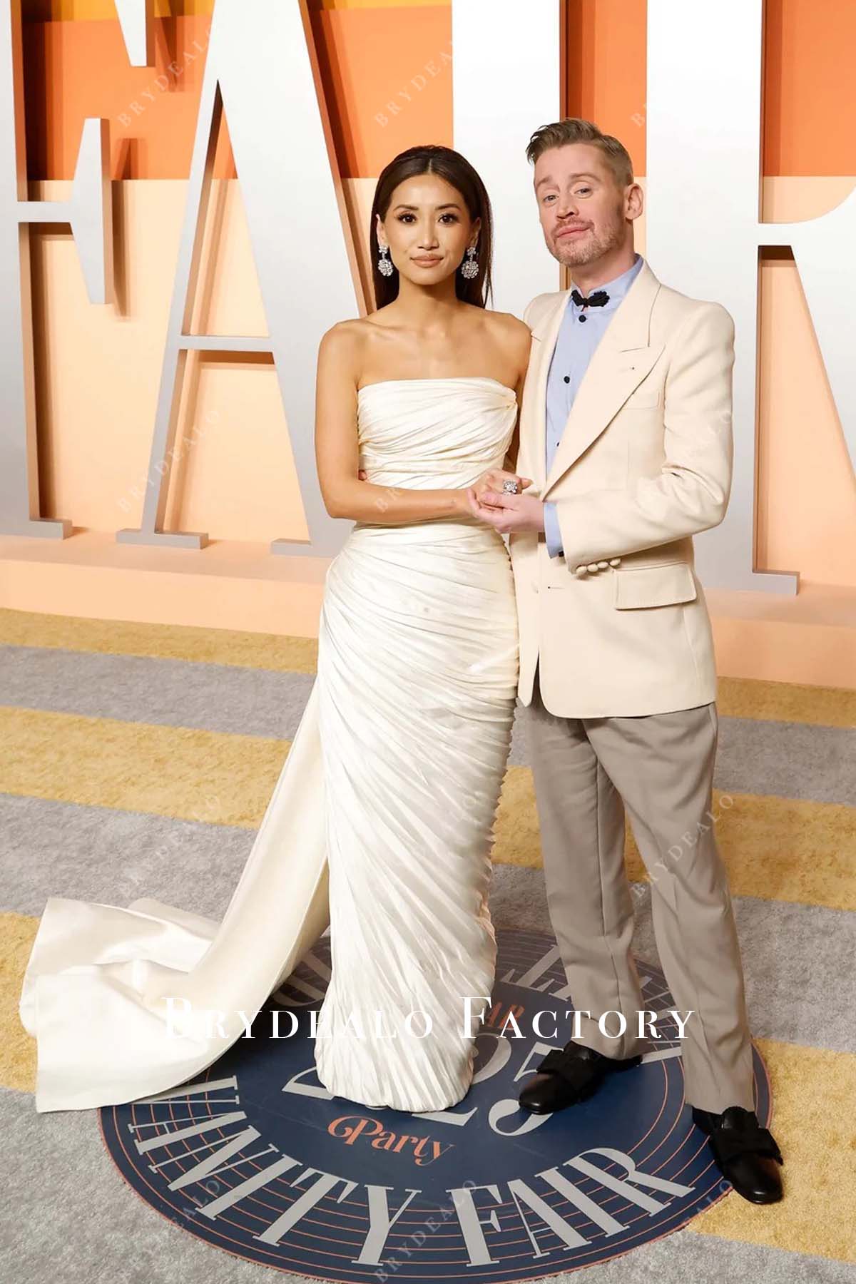 Brenda Song ivory pleated 2025 Vanity fair party dress
