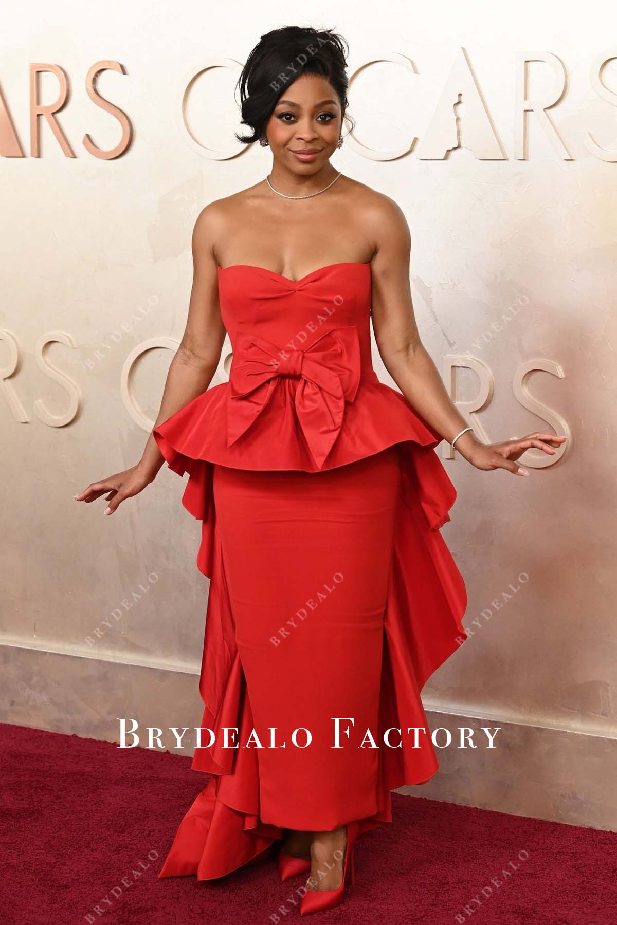 Bresha Webb red 2025 Oscars red carpet sheath formal dress
