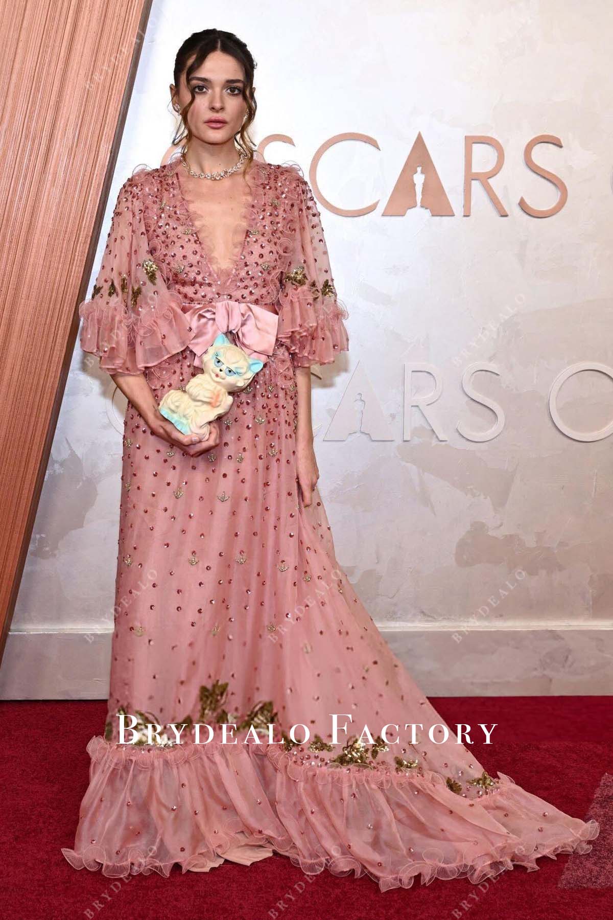 Charlotte Lawrence 2025 Oscars red carpet dusty rose prom dress