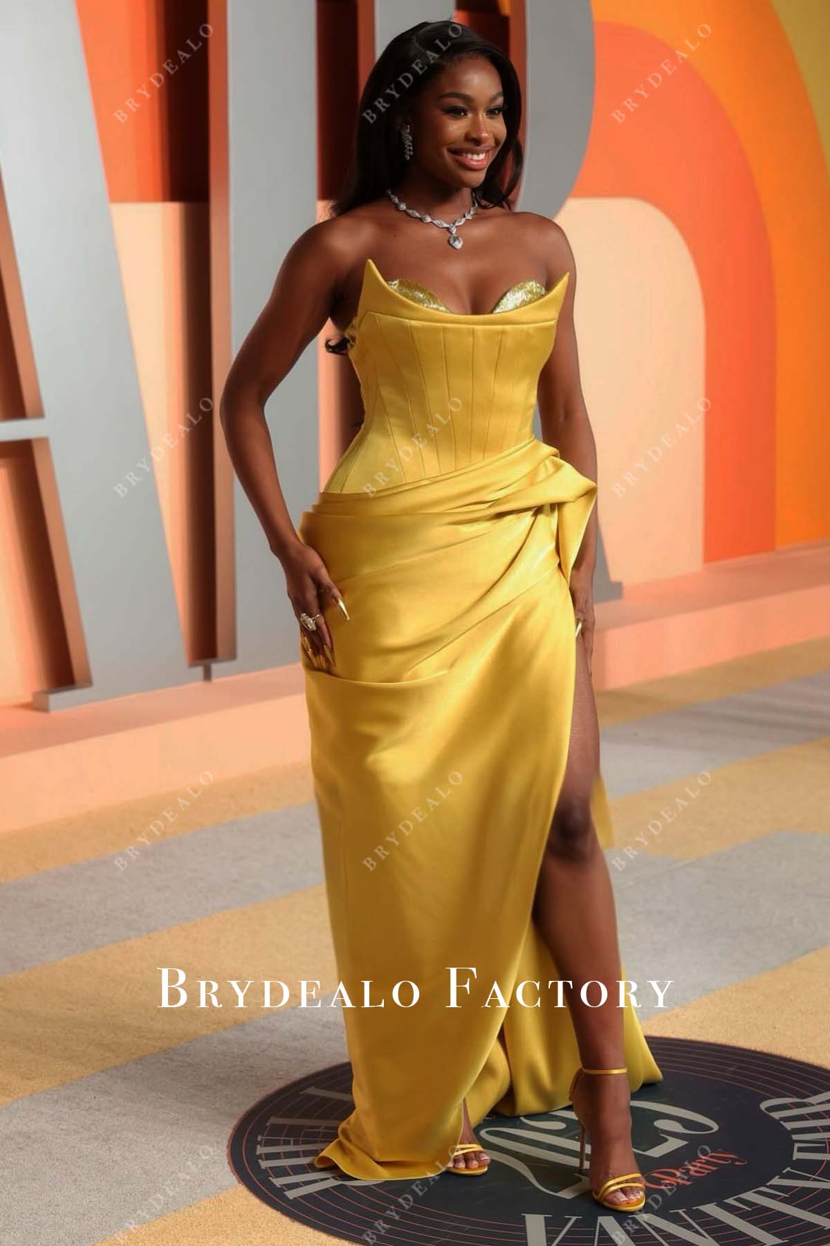 Coco Jones bright gold corset 2025 Vanity fair party dress