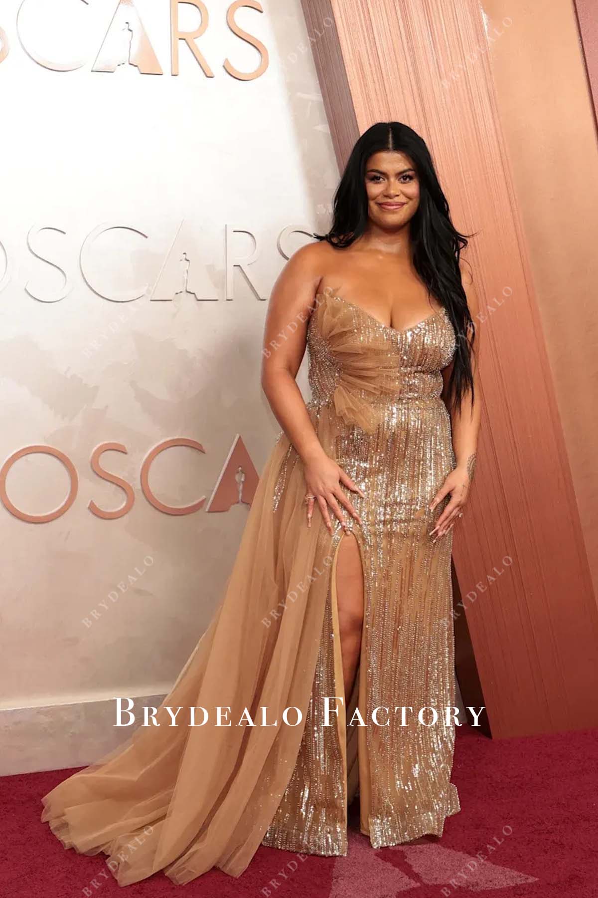 Drew Afualo 2025 Oscars red carpet high slit dress