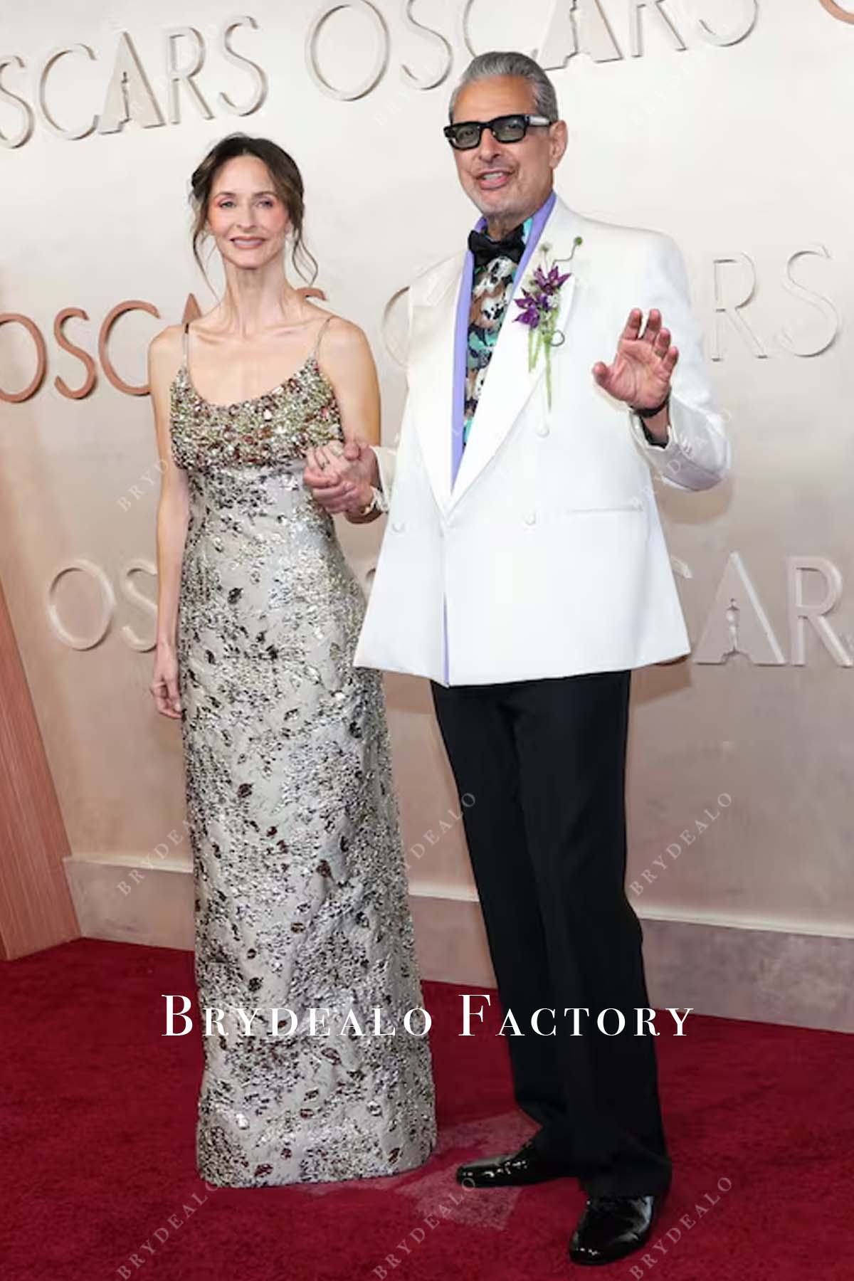 Emilie Livingston 2025 Oscars red carpet floor length dress