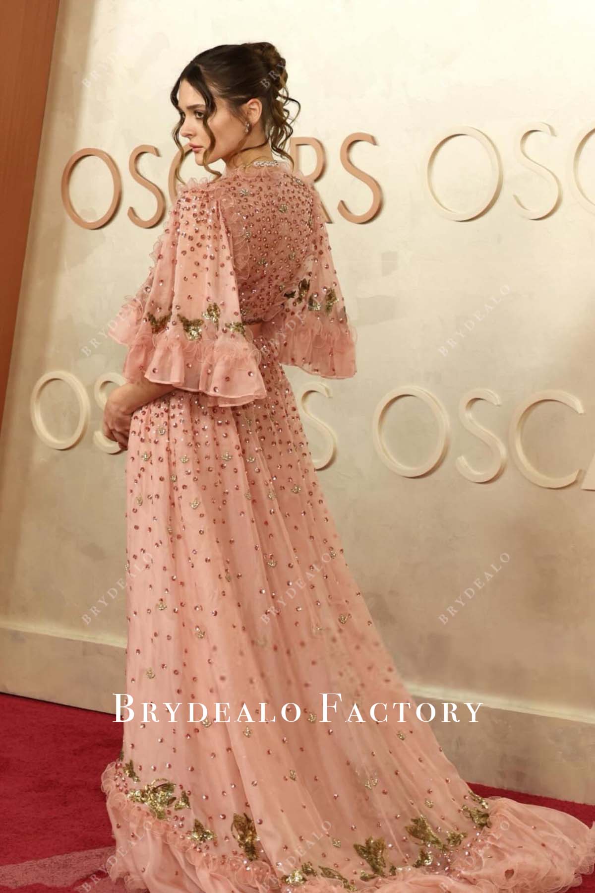 flutter sleeves Charlotte Lawrence 2025 Oscars red carpet prom dress