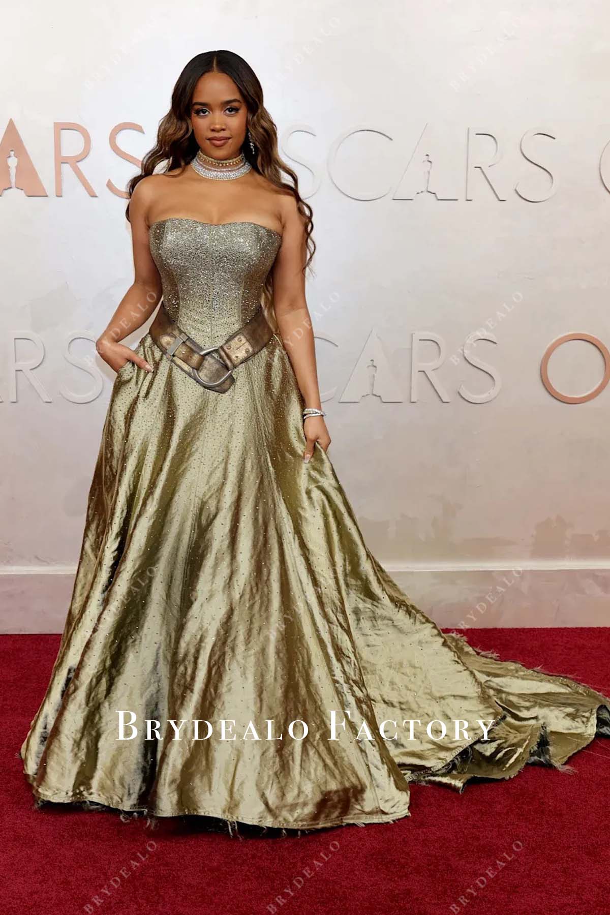 H.E.R. 2025 Oscars red carpet strapless prom dress