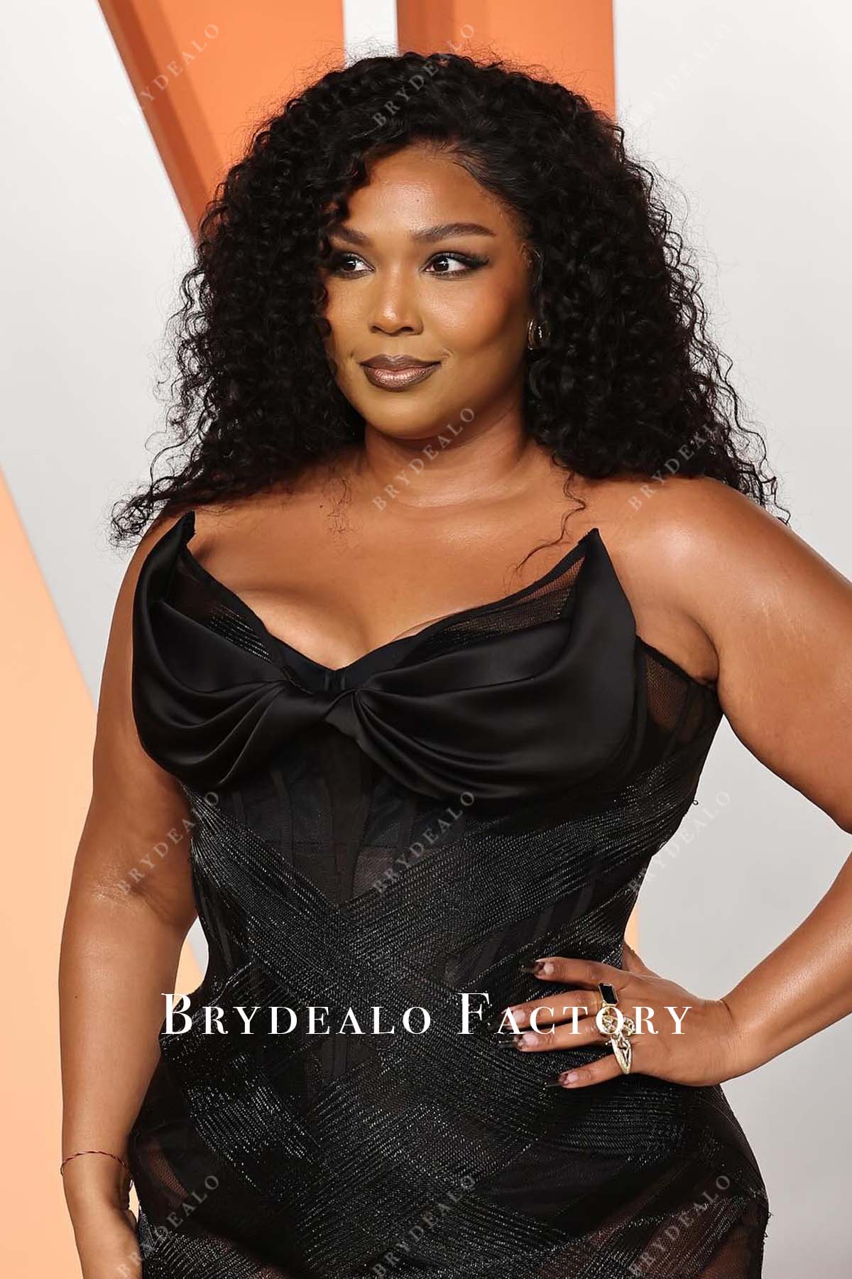 Lizzo black v neck 2025 strapless Vanity fair party dress