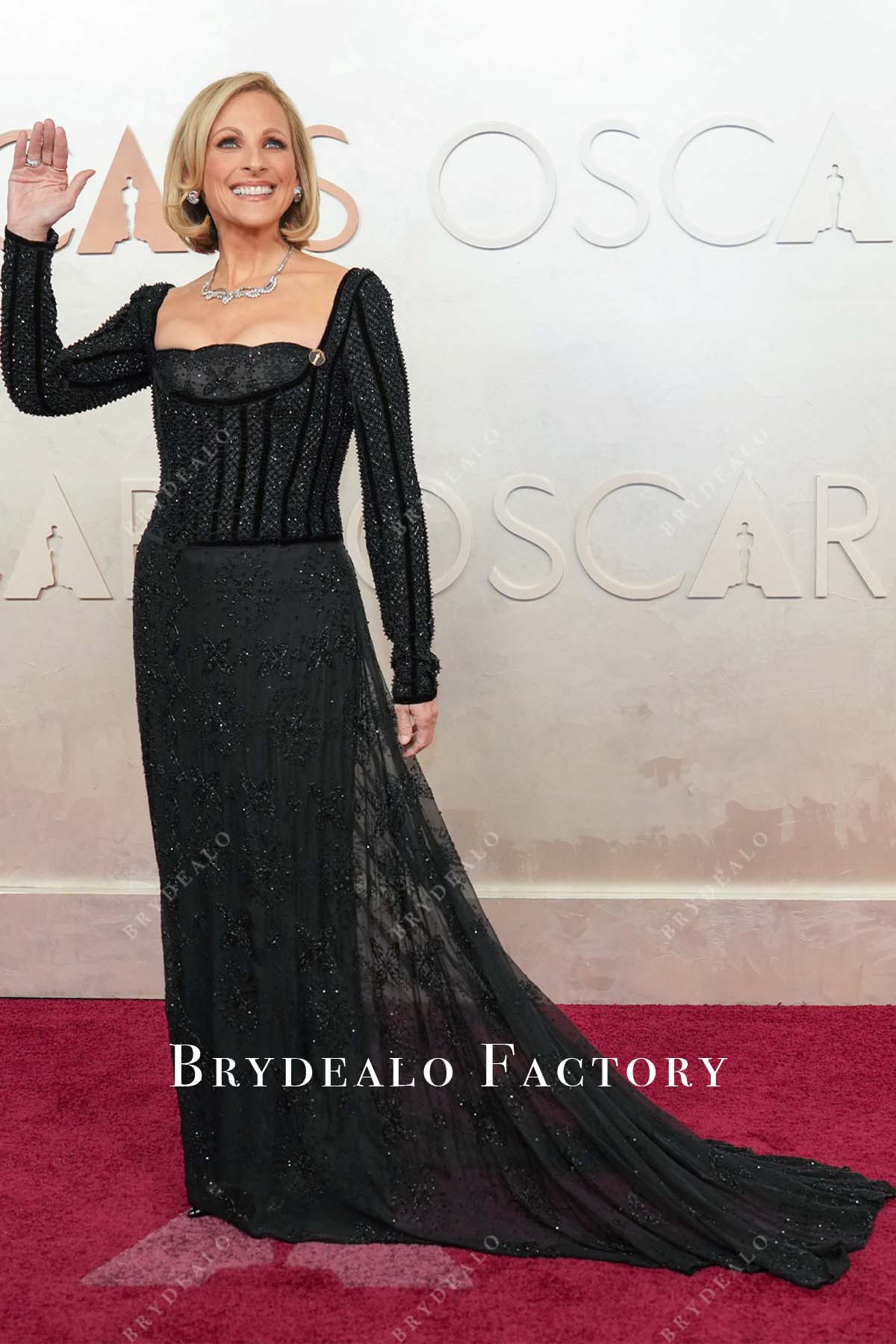 Marlee Matlin black 2025 Oscars red carpet chapel train dress