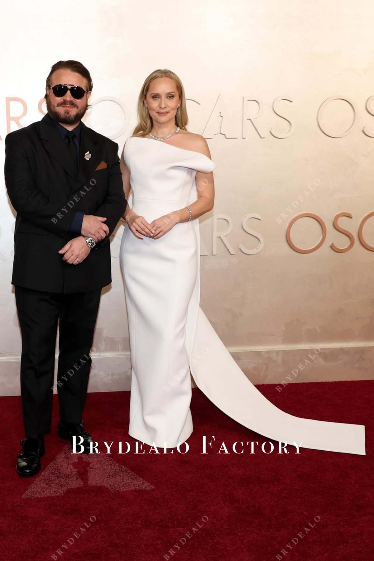 Mona Fastvold white sheath 2025 Oscars red carpet dress