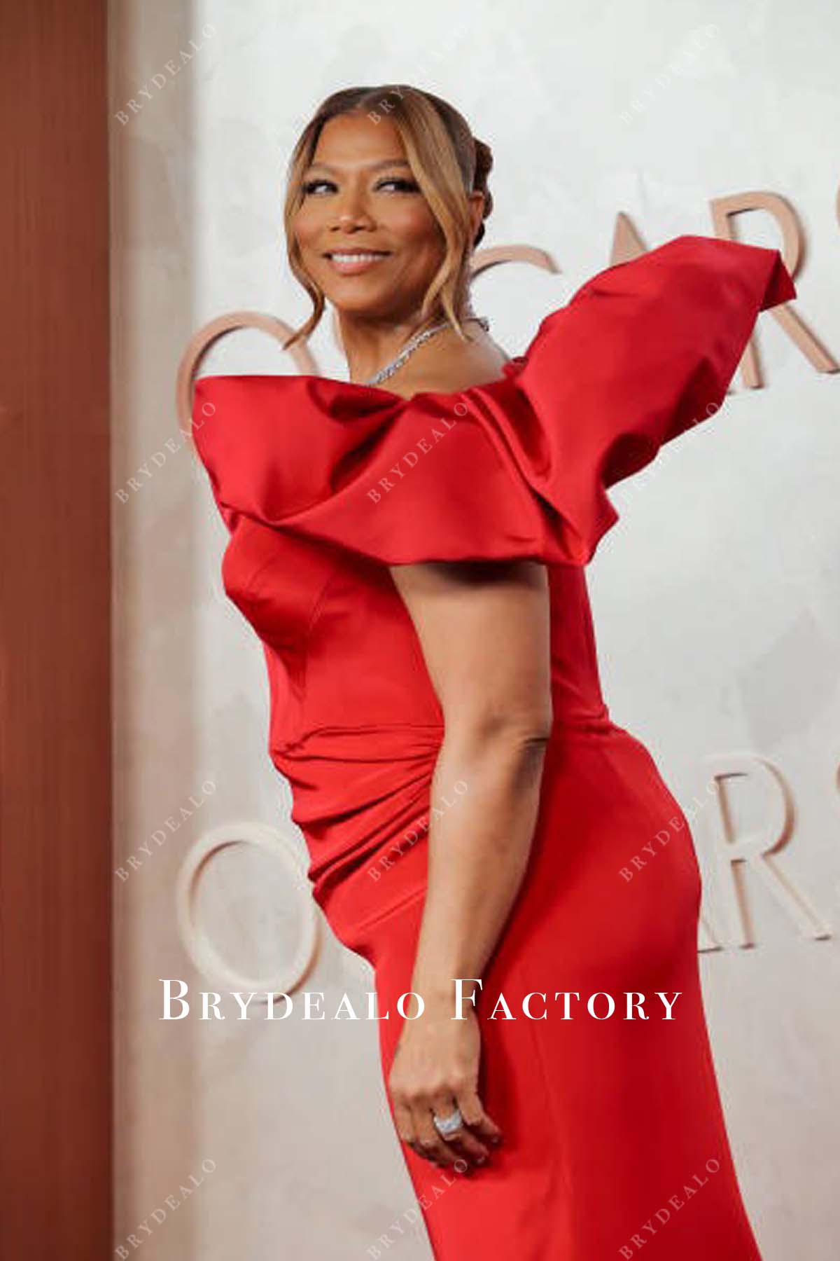 Queen Latifah short sleeves 2025 Oscars red carpet dress