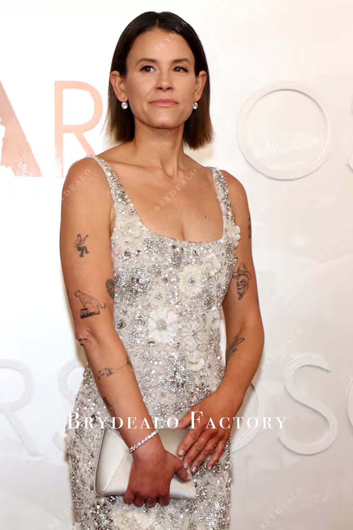 Shauna Robertson 2025 square neck Oscars red carpet light champagne dress