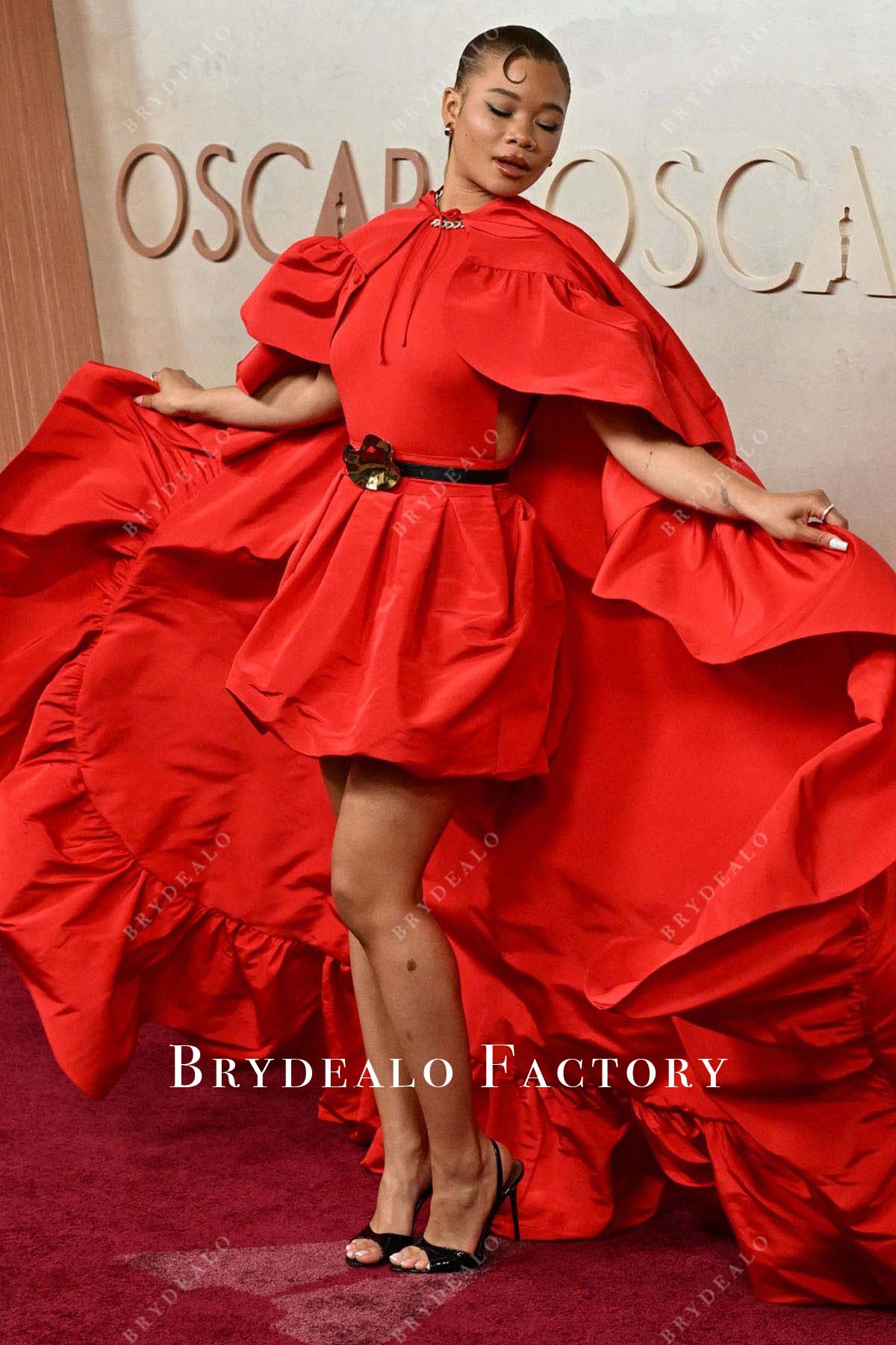 Storm Reid red cape 2025 Oscars red carpet dress