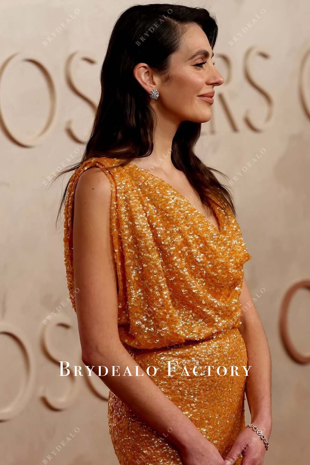 Vic Carmen Sonne gold glitter sleeveless 2025 Oscars red carpet dress