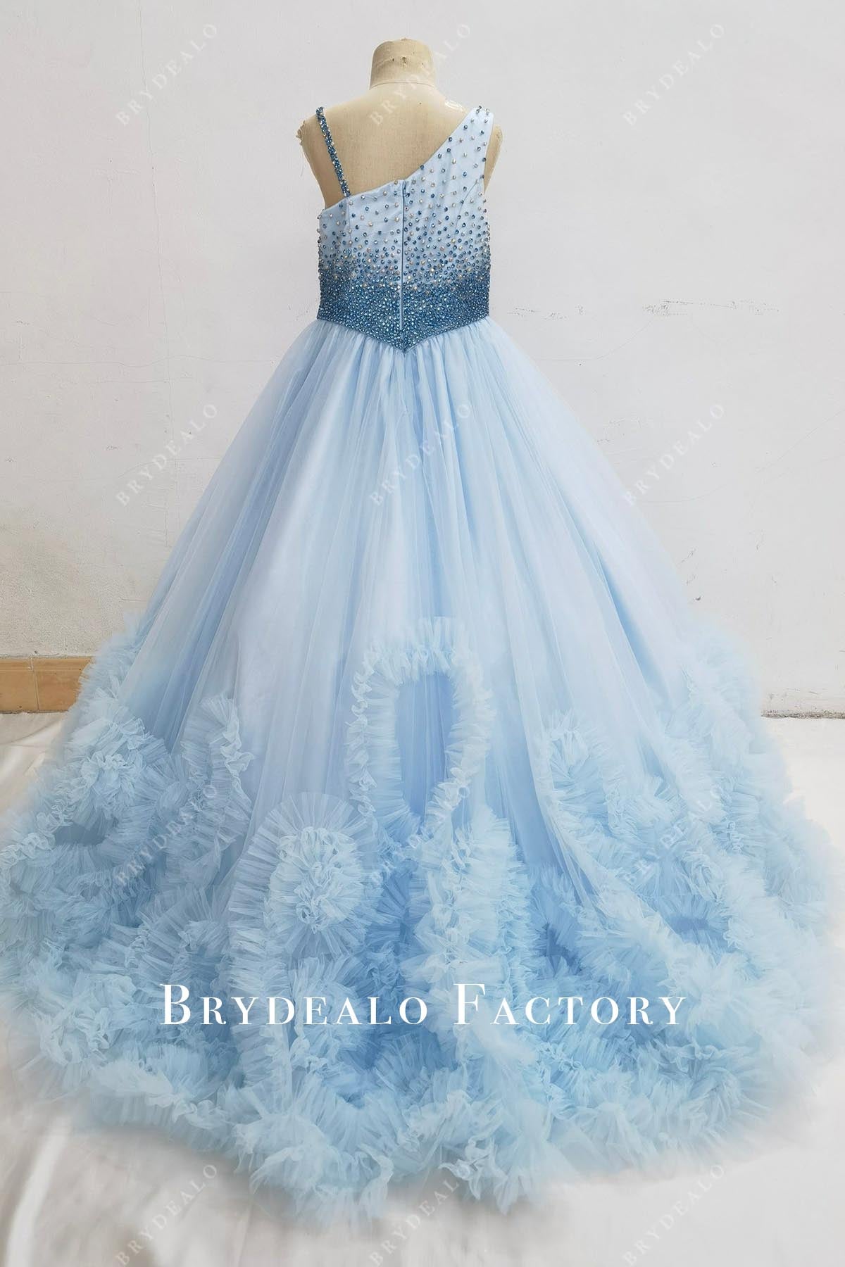 blue ruffled pageant dress