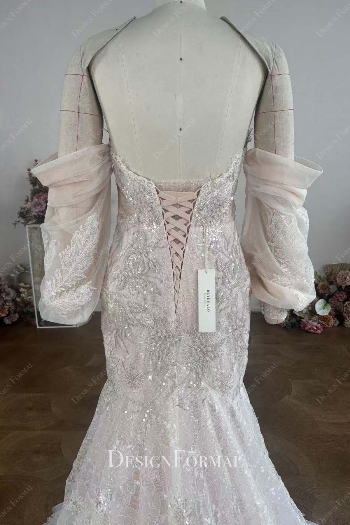 blushing pink lace up back wedding dress