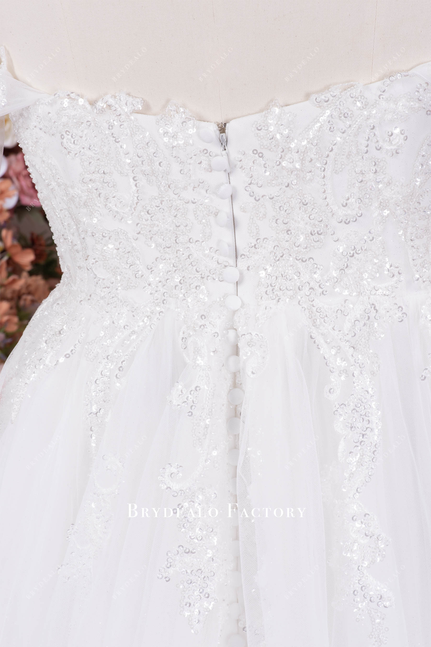 buttoned back wedding dress