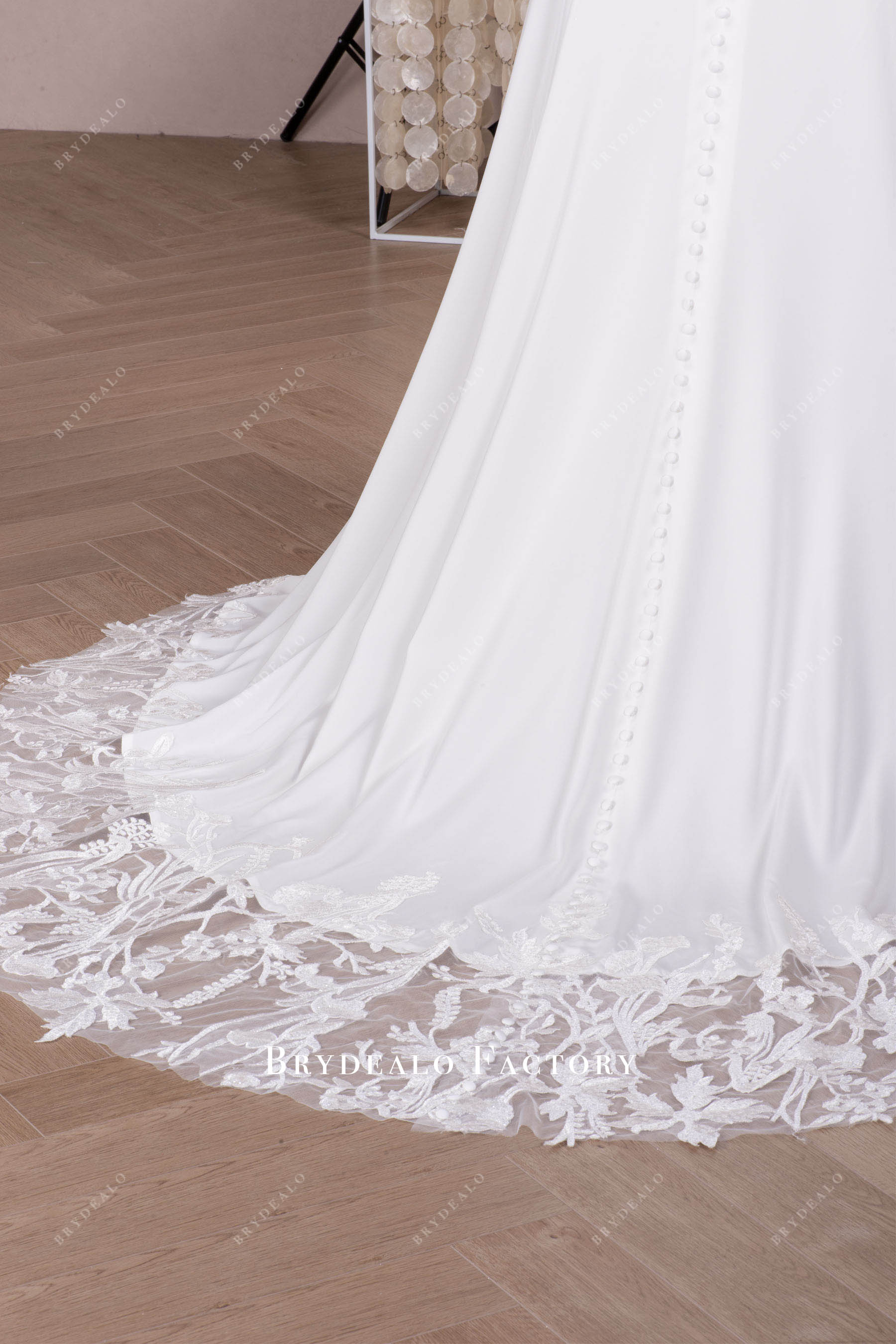 buttoned lace train wedding dresss