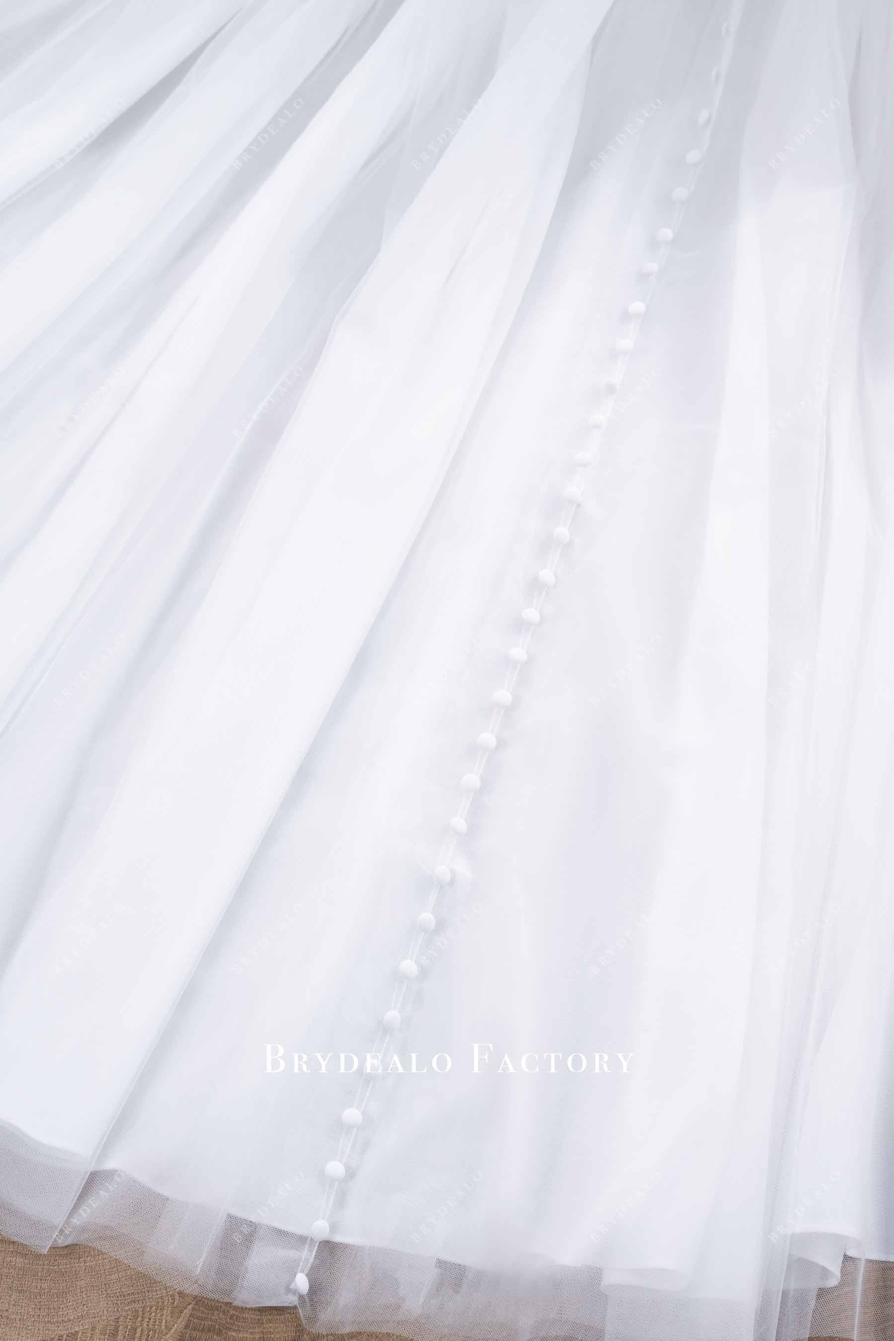 buttoned train bridal dress