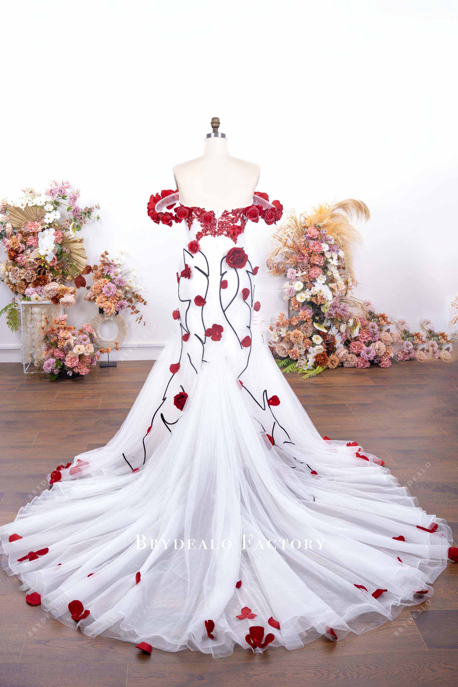 chapel train white dress with red flower