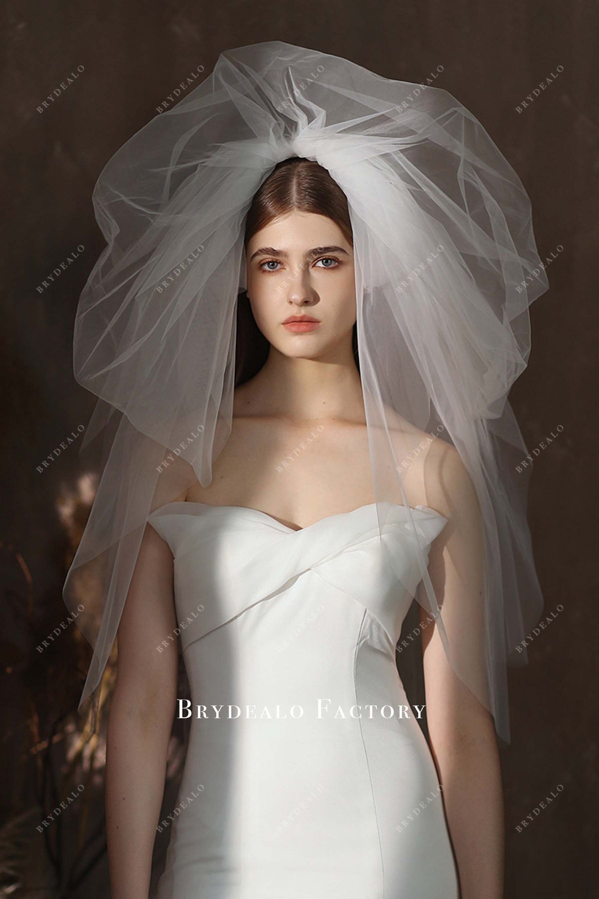 Chic Elbow Length Multi Layered Puffy Tulle Bridal Veil display picture 1