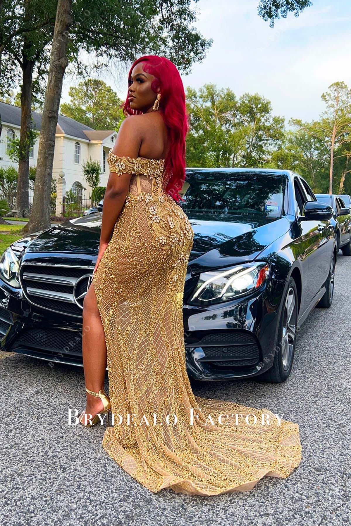 court train gold sparkly off shoulder corset prom gown