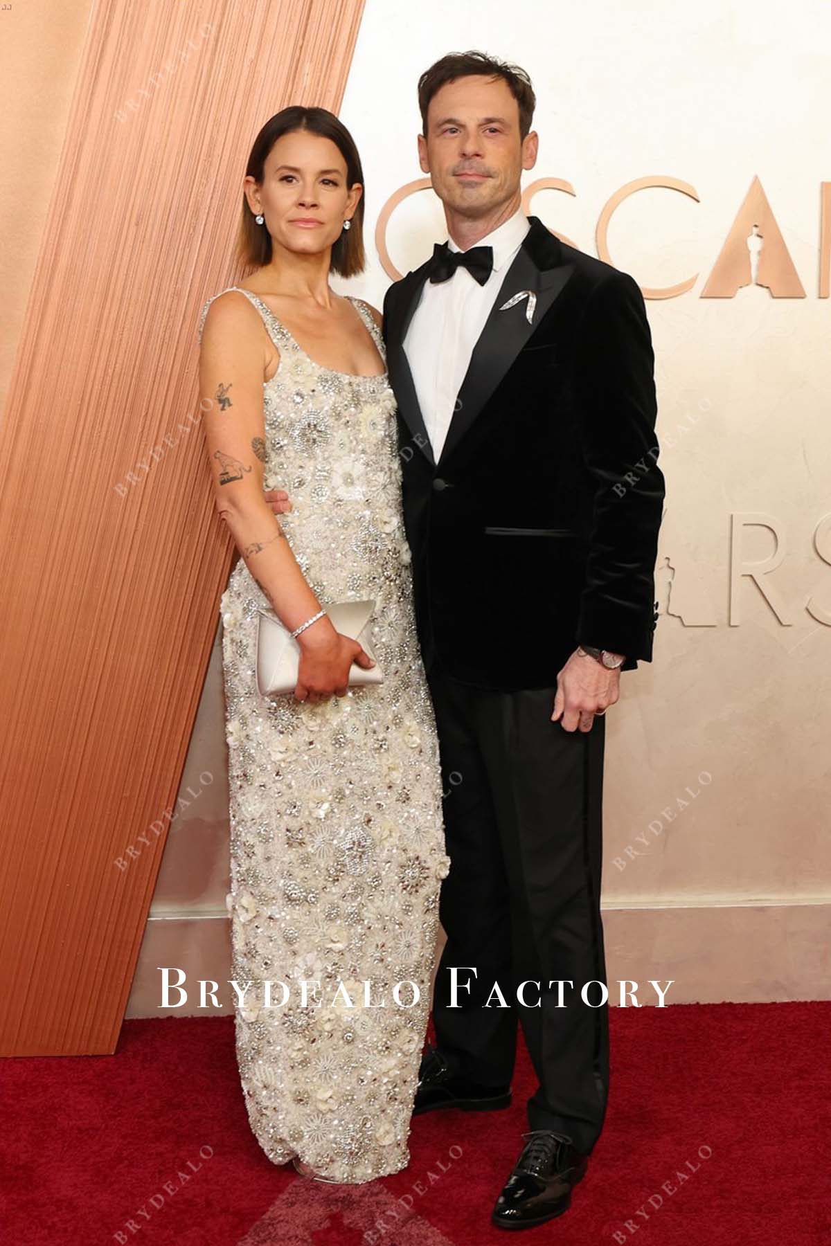 crystals Shauna Robertson 2025 Oscars red carpet light champagne dress