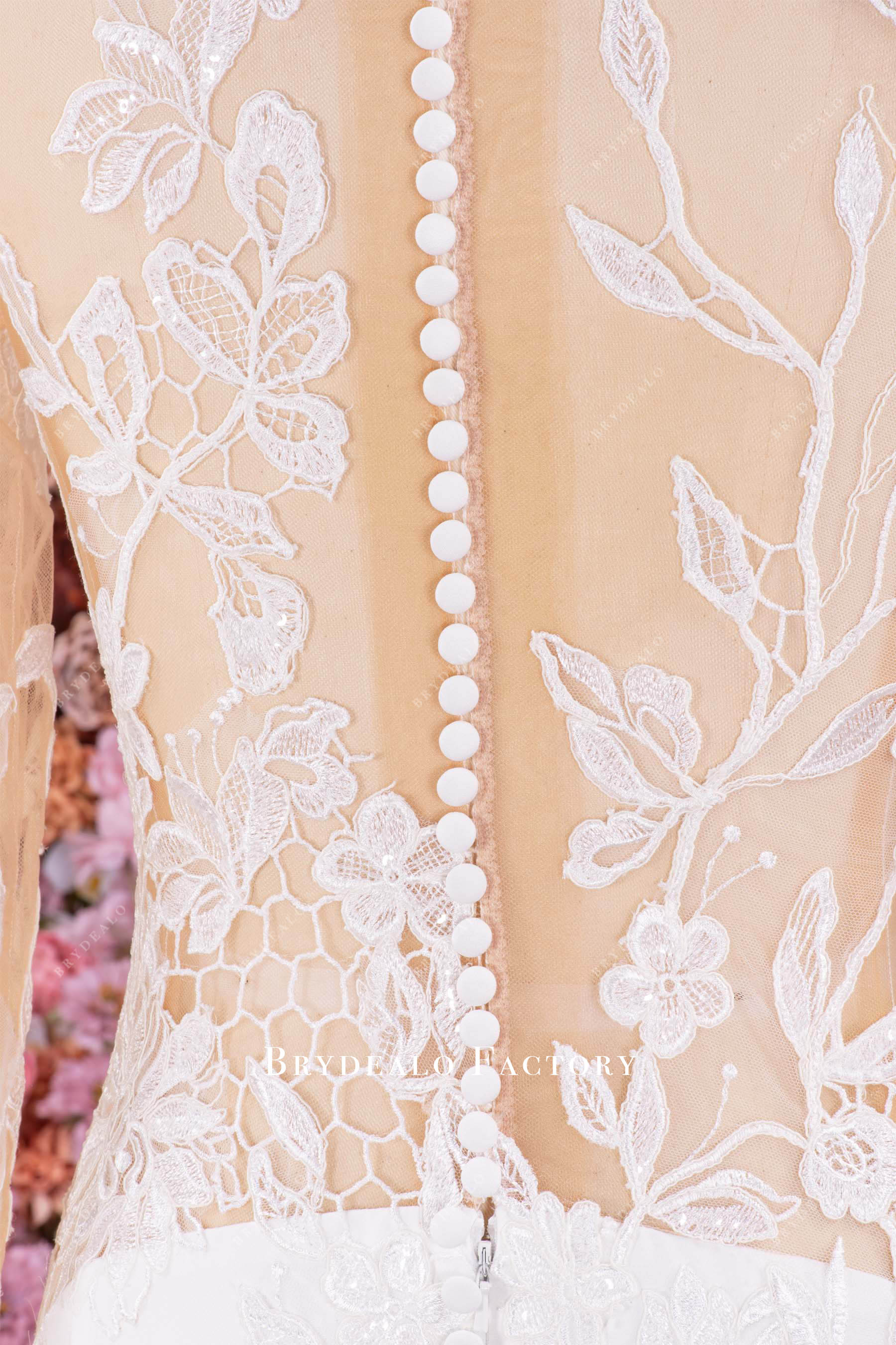 delicate buttoned back wedding dress