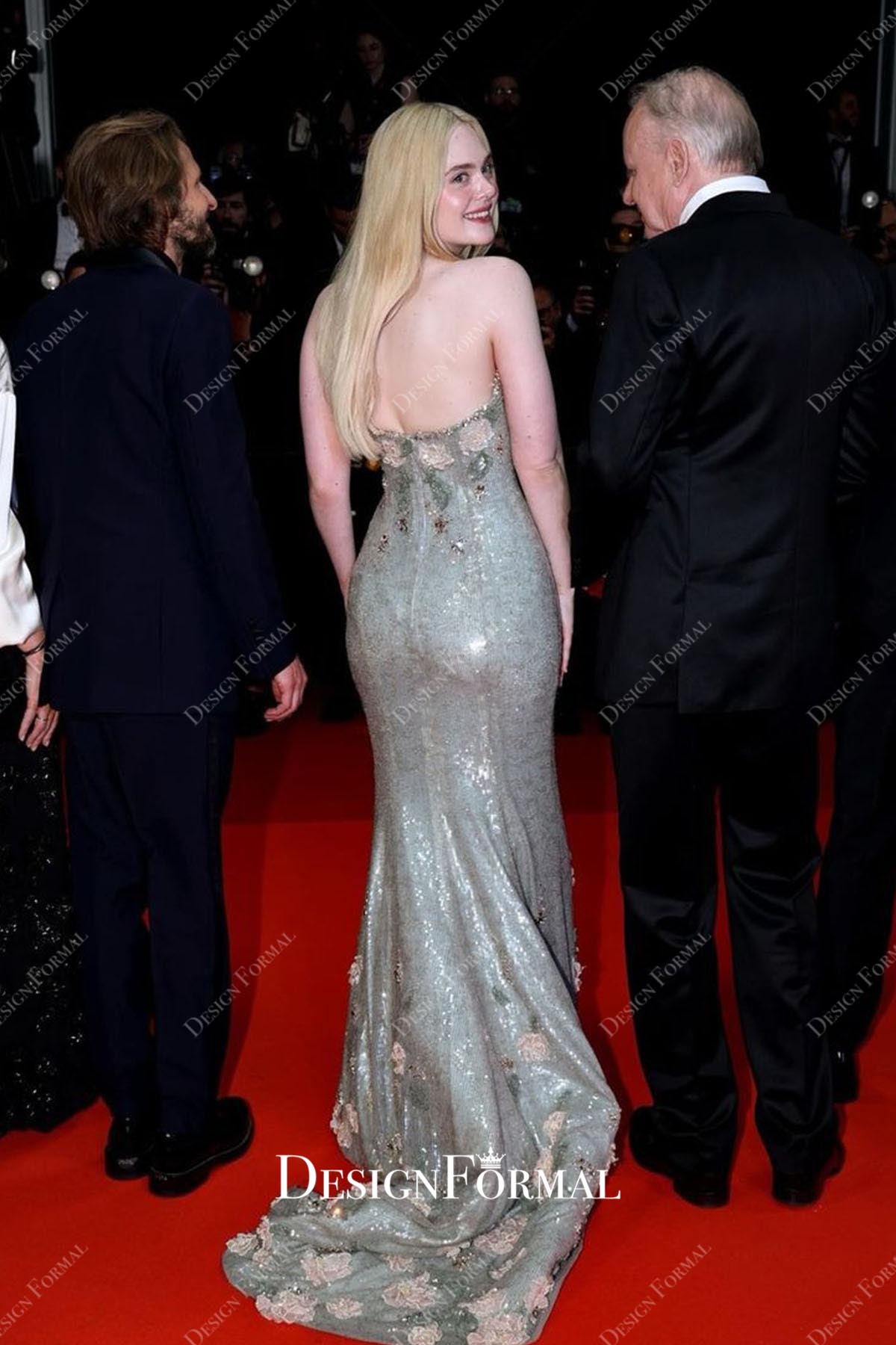 Elle Fanning dusty sage 2025 Cannes Sentimental Values Premiere dress