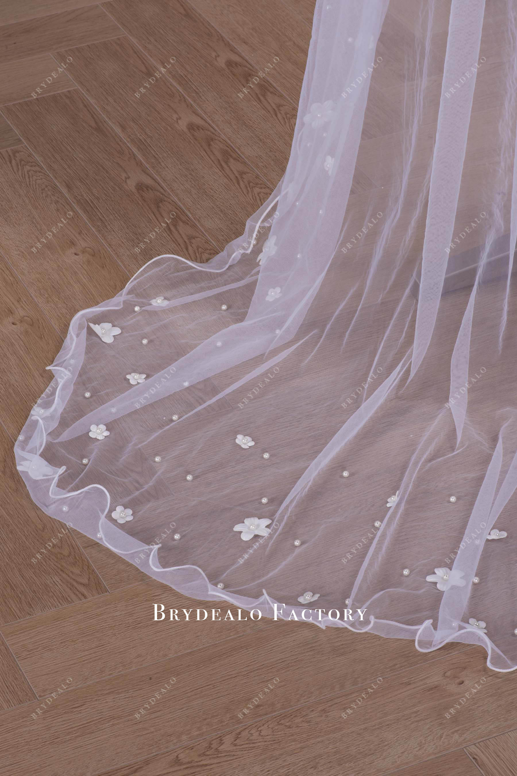 hand sewn flowers pearls veil