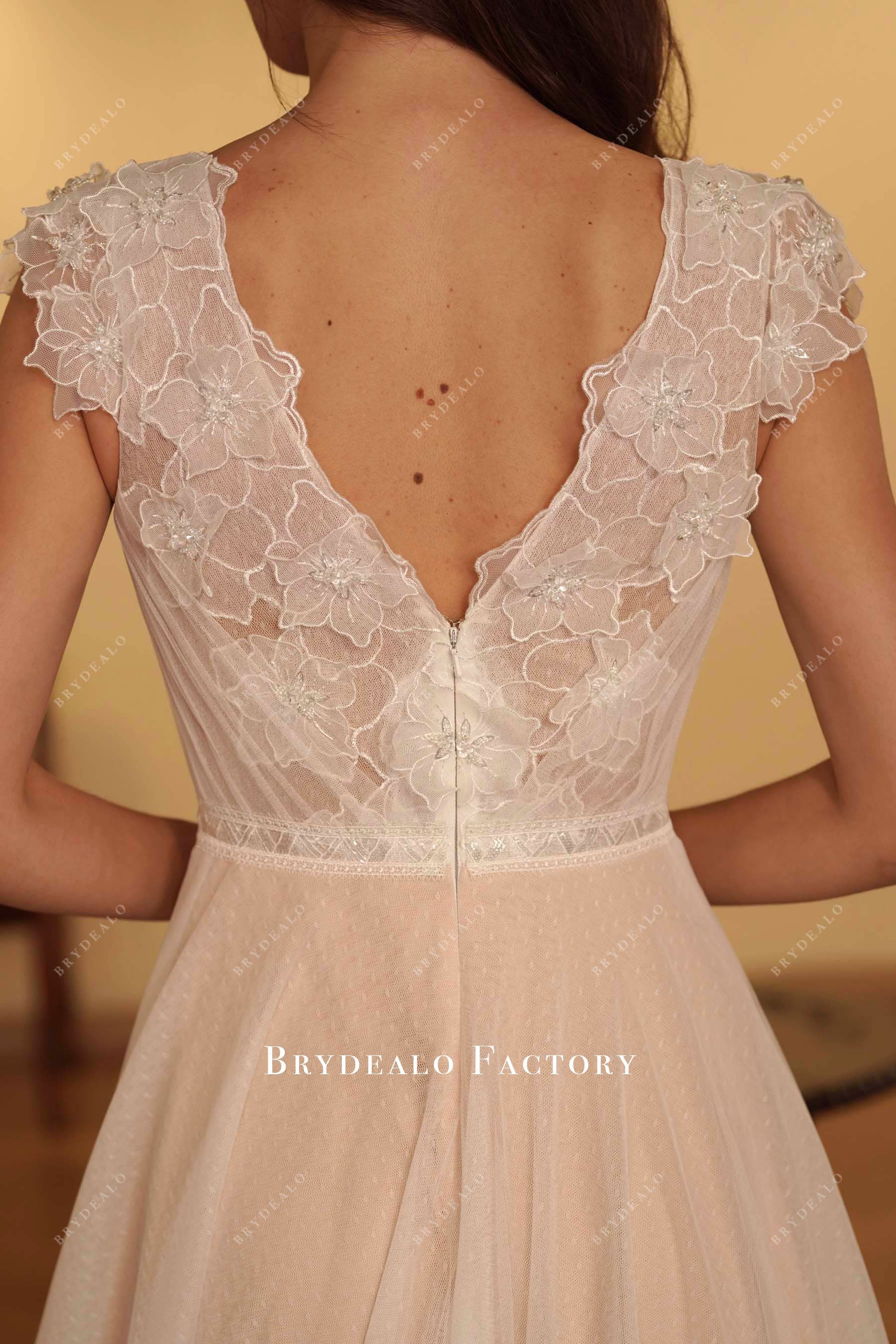 handsewn beaded lace bridal dress