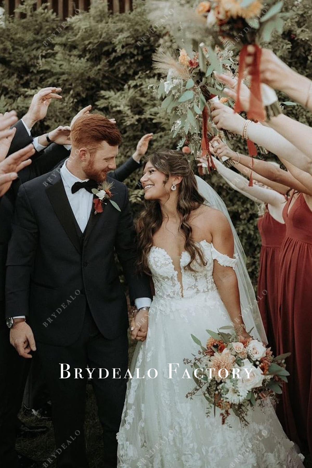 lace appliques plunging neck wedding dress