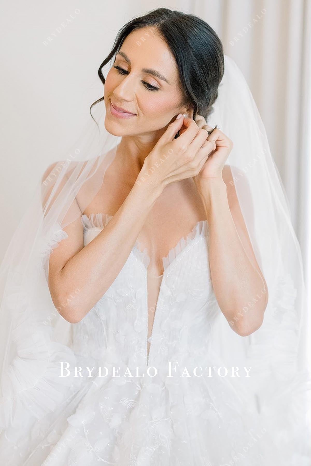 lace appliques plunging wedding dress