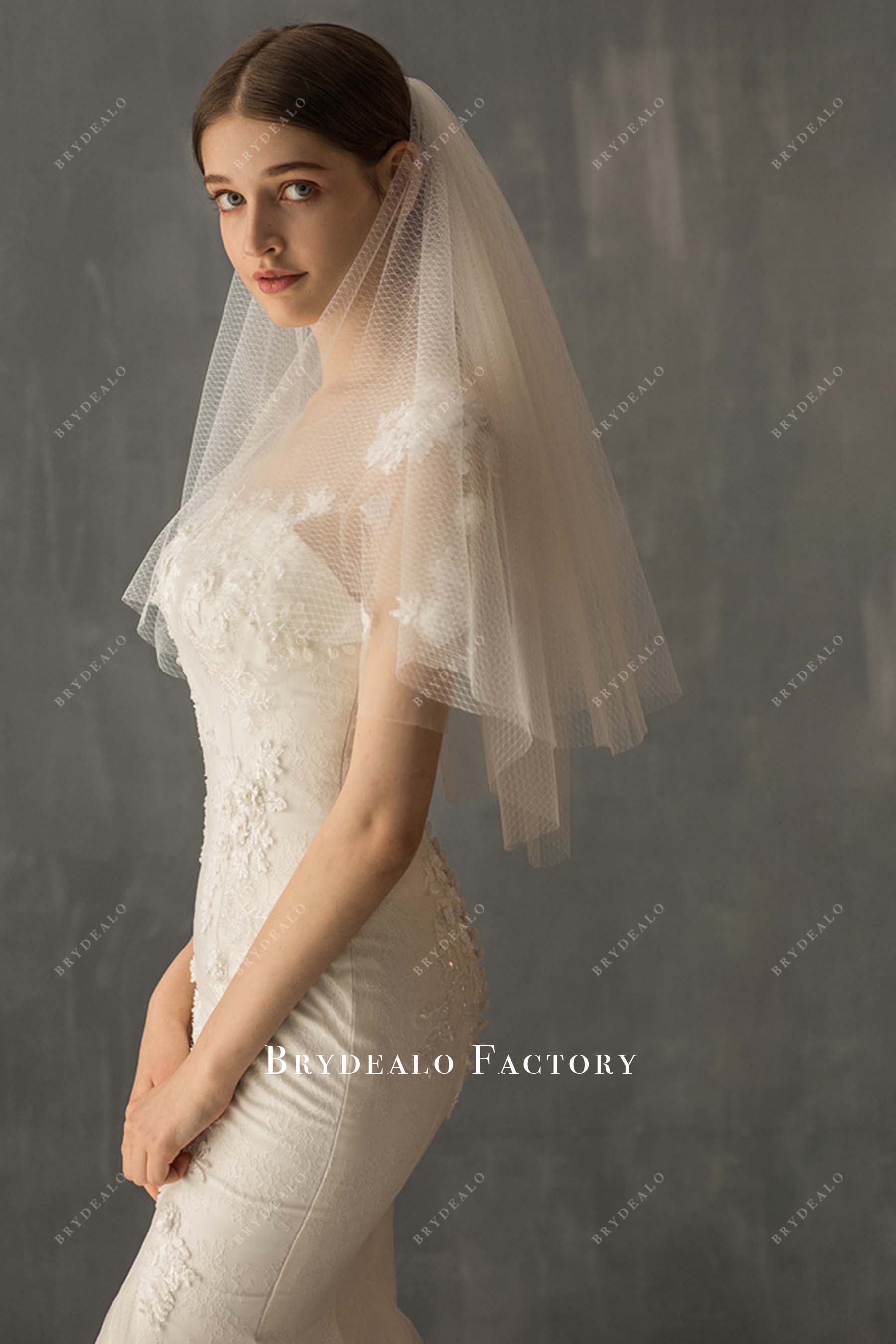 multi layered elbow length wedding veil