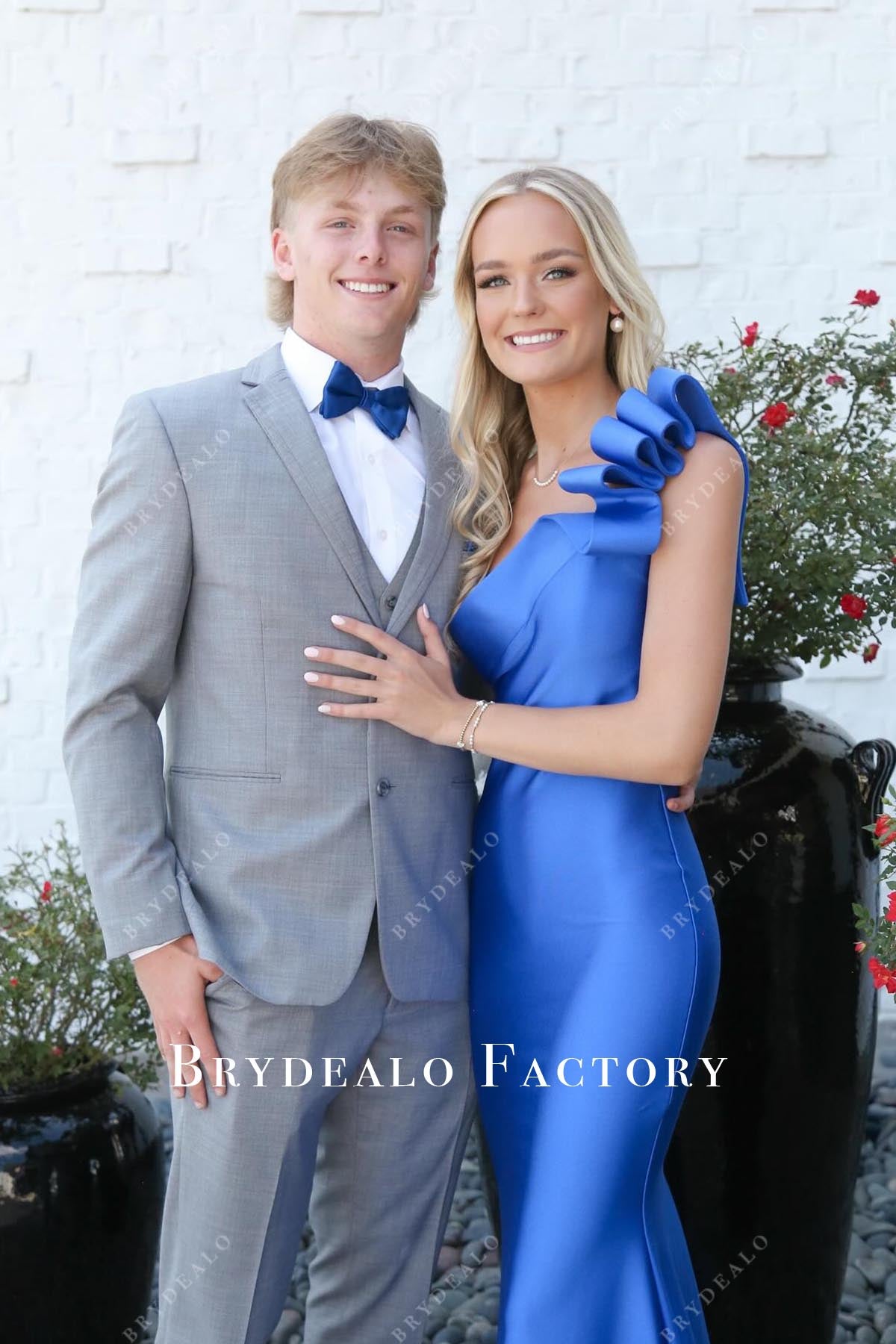 ocean blue ruffled shoulder prom dress