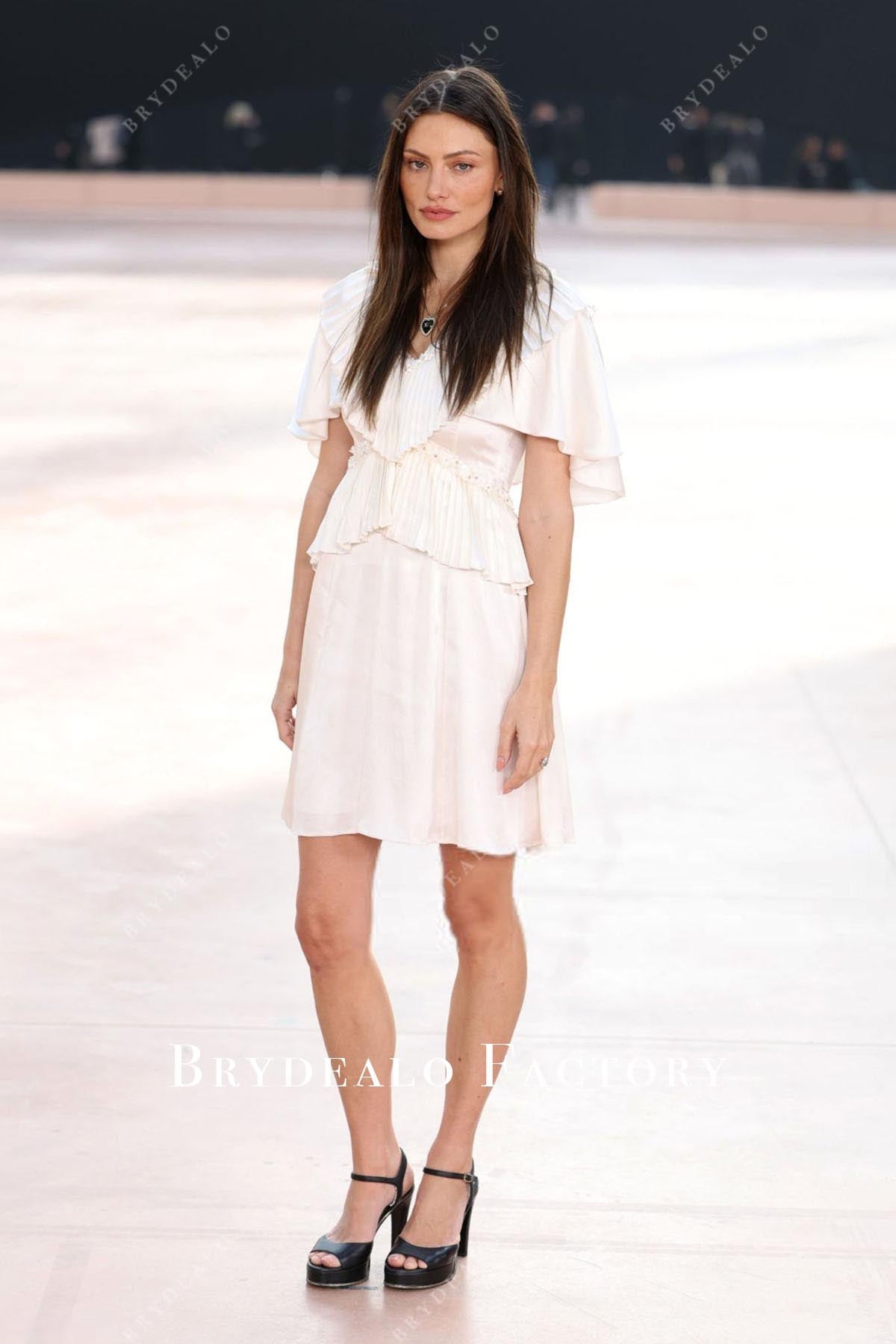 Phoebe Tonkin flutter sleeves formal dress Chanel show 2025