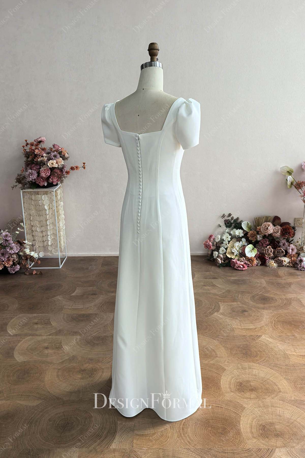simple white crepe buttoned back wedding dress