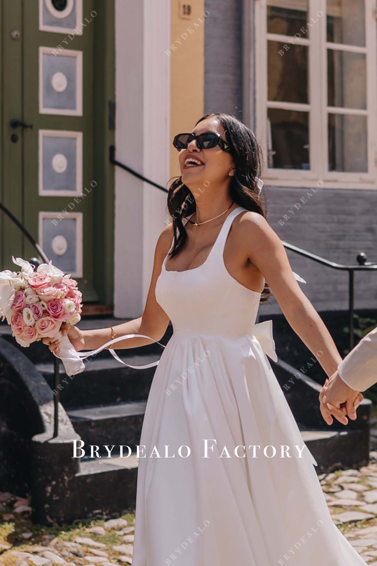 sleeveless white satin destination wedding dress