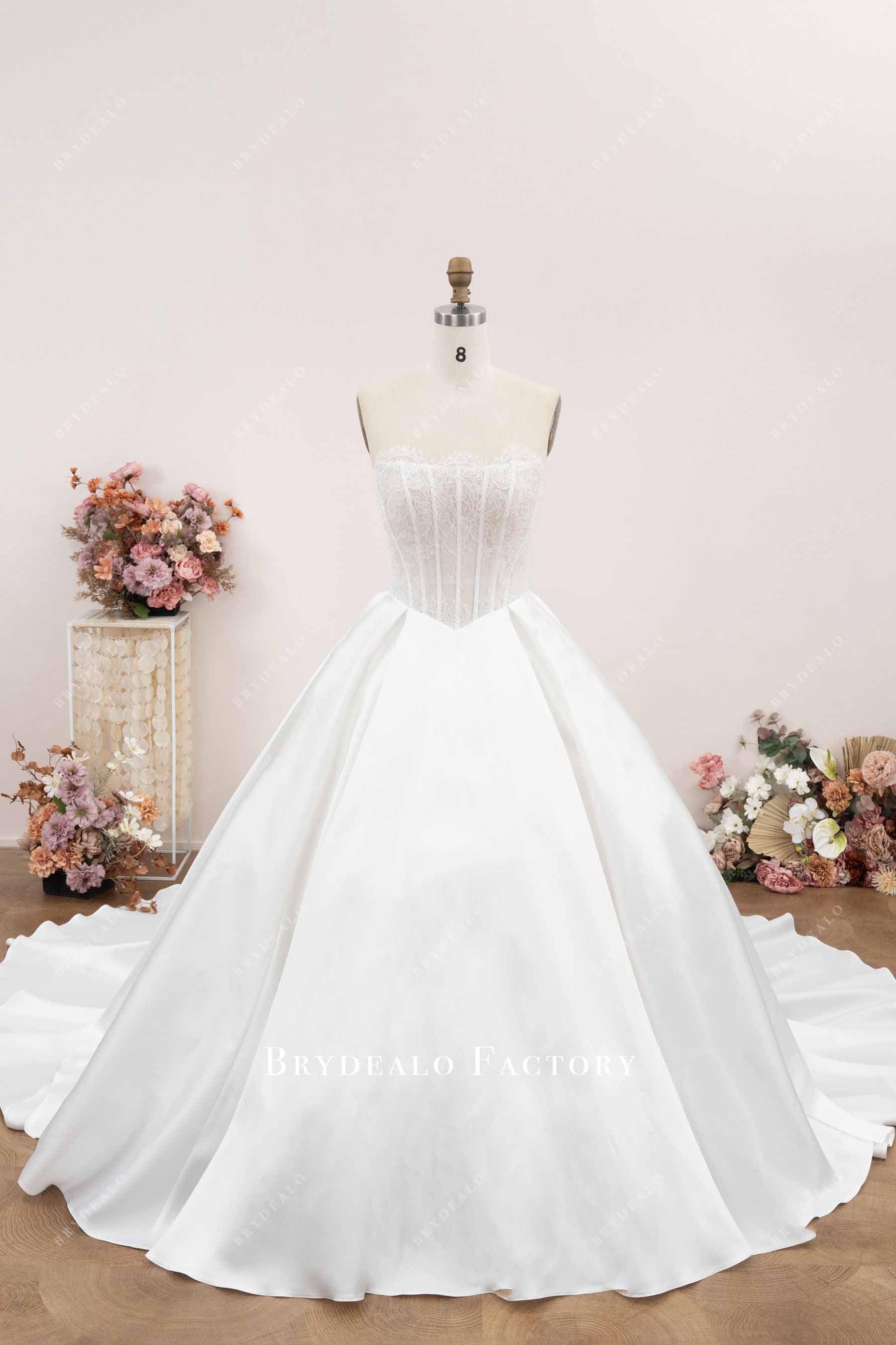 strapless Basque waist wedding ballgown