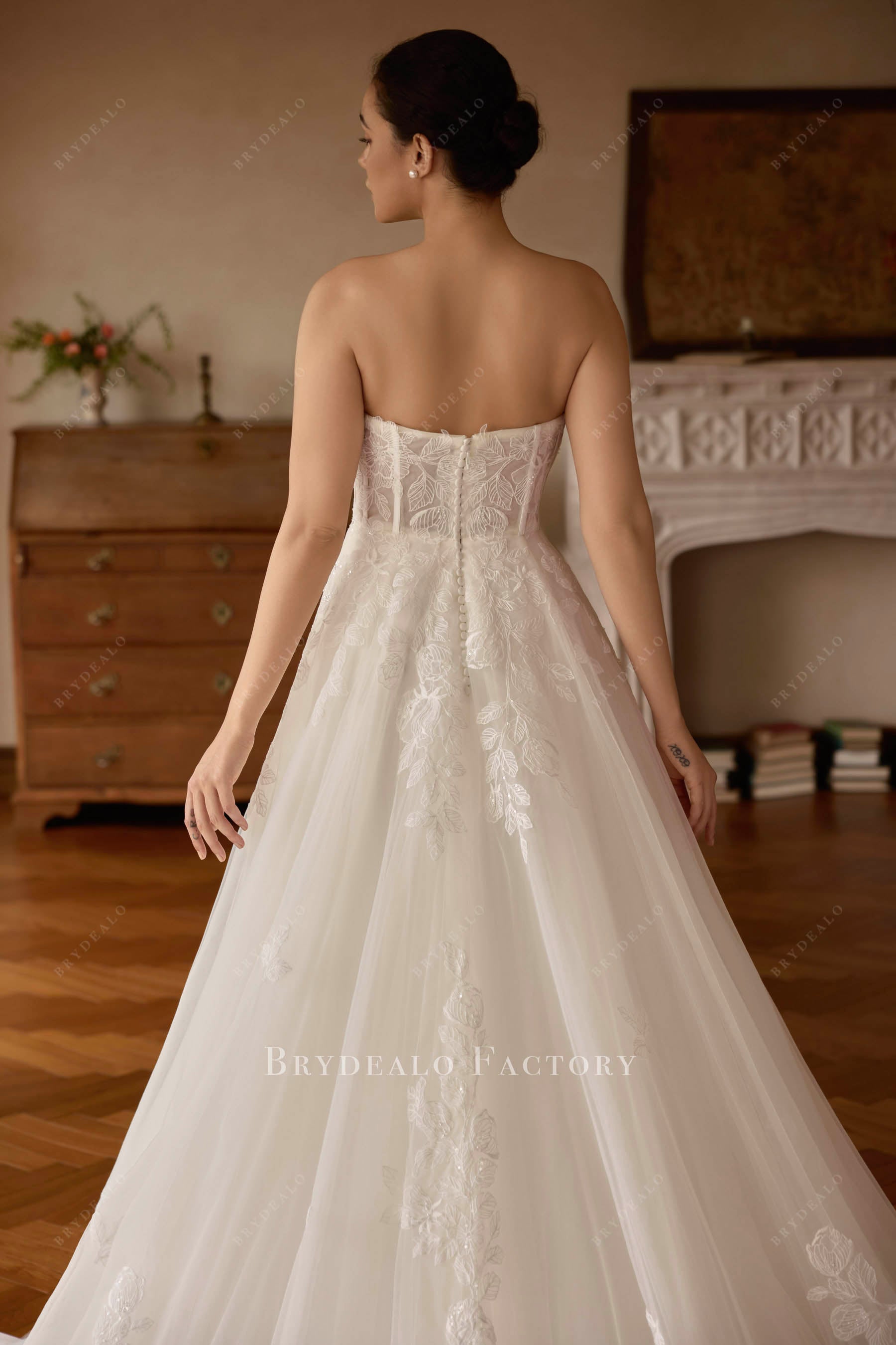 strapless buttoned back bridal dress