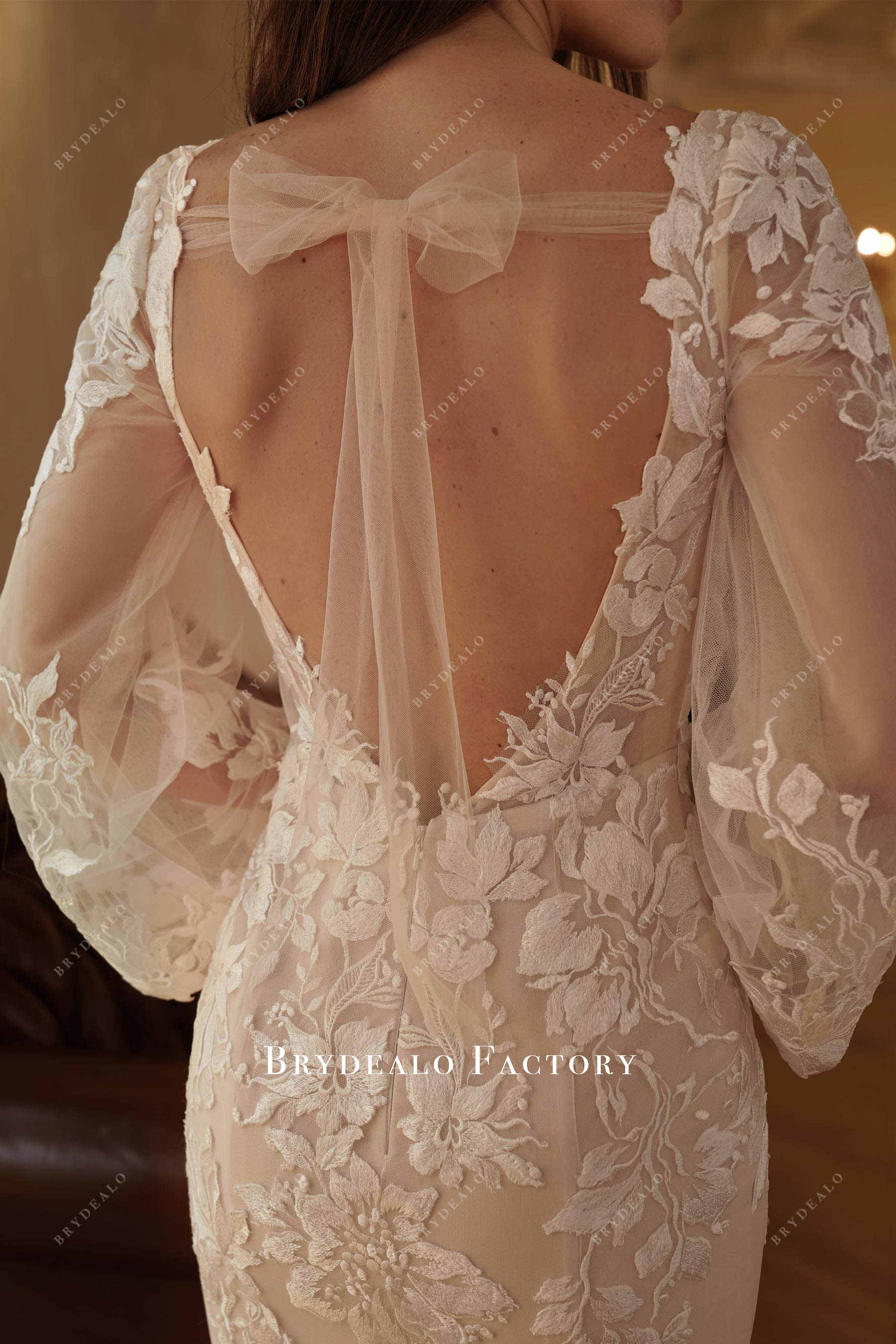 tulle bow closure back wedding dress