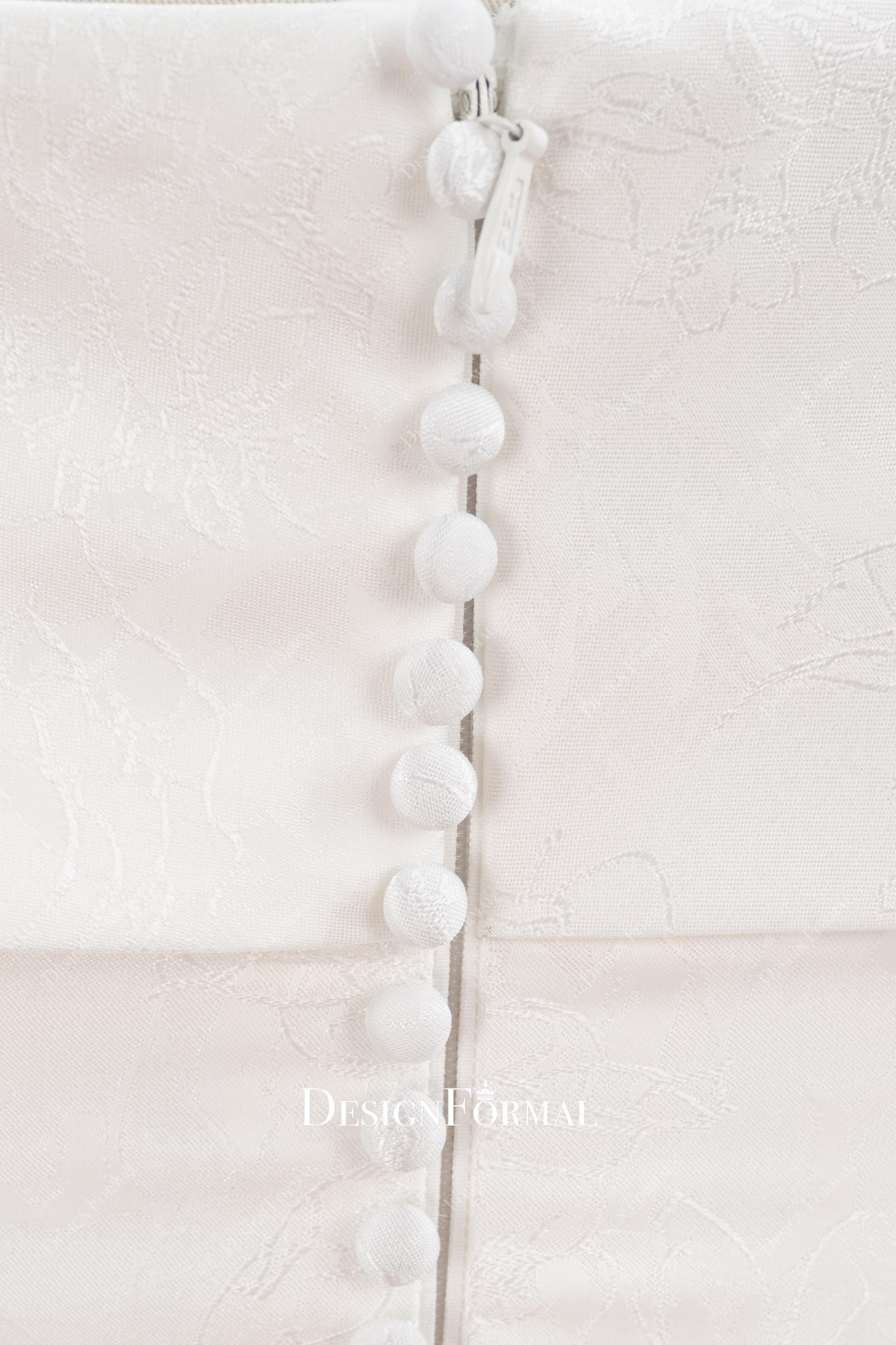 white buttons up back wedding dress