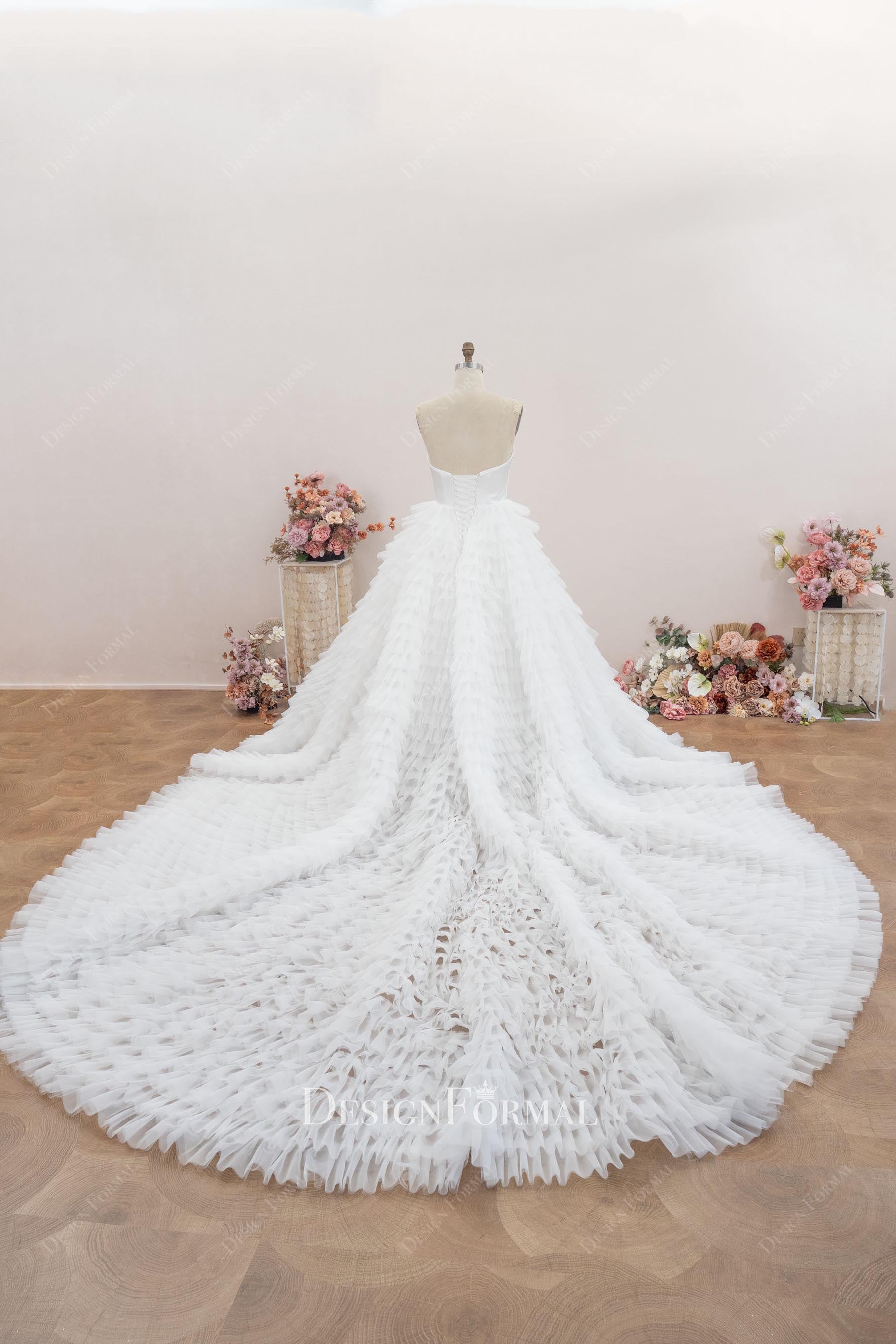 white cathedral train strapless wedding dress