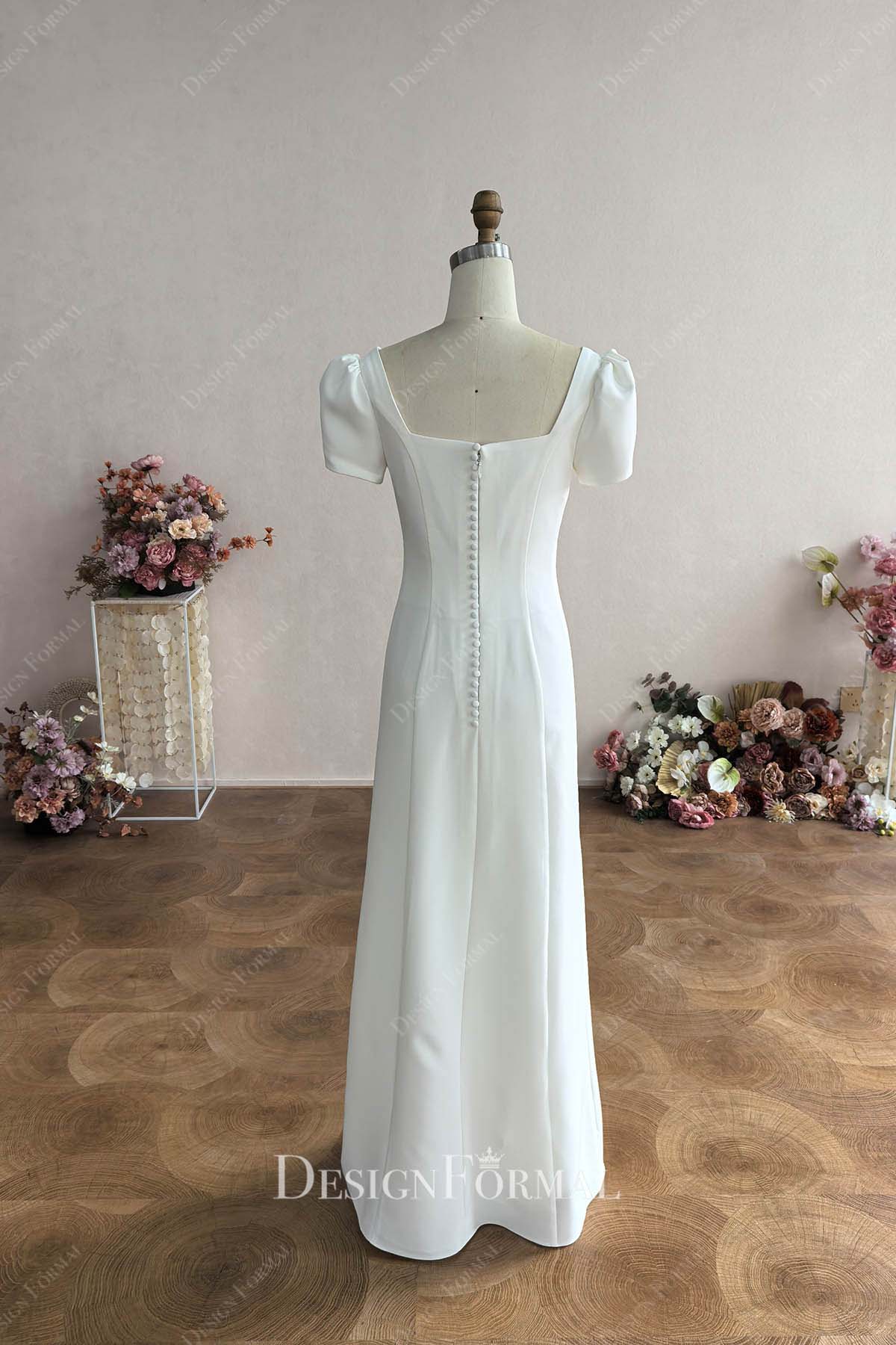 white crepe buttoned back wedding dress