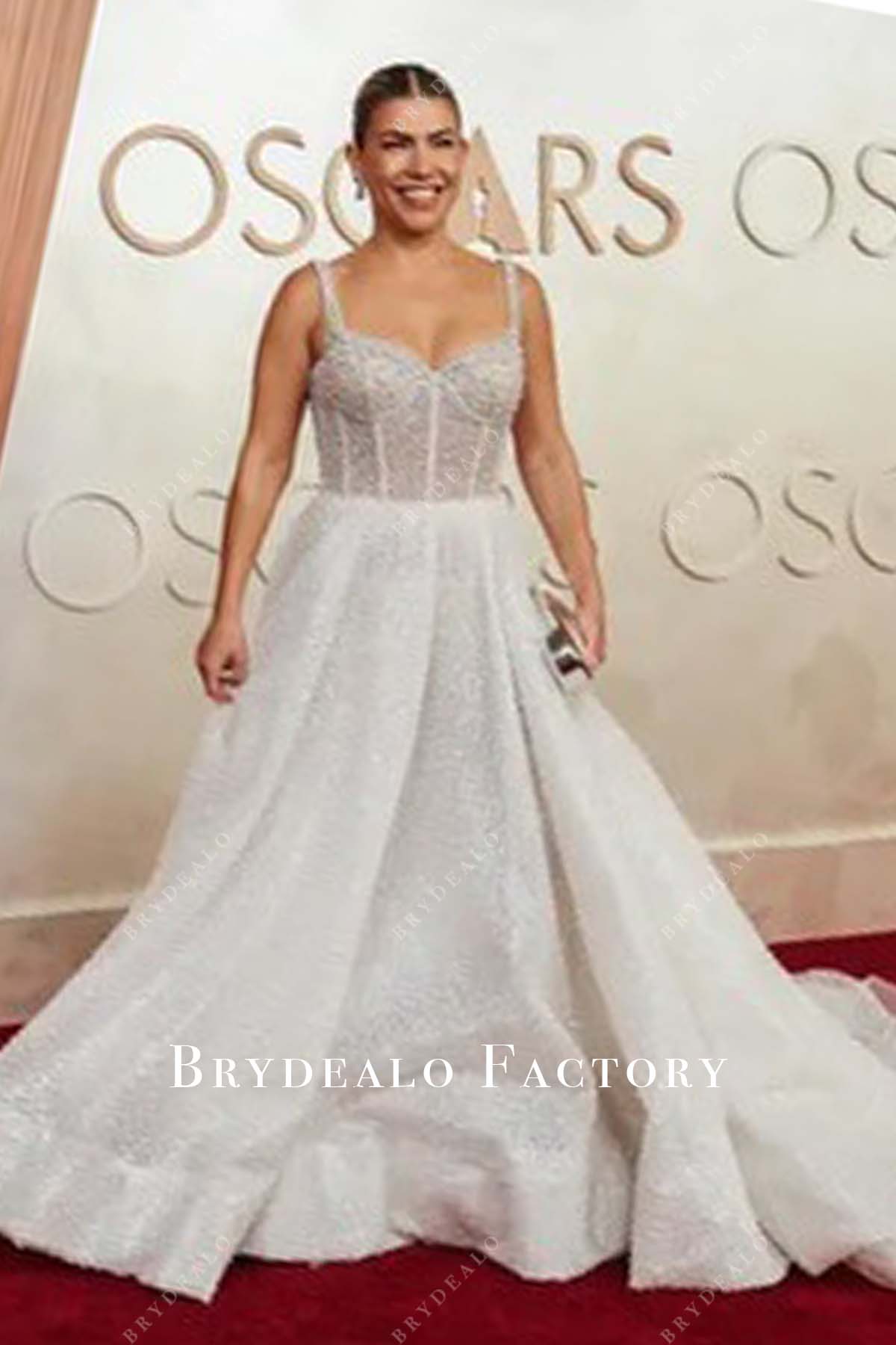 white glitter Lee Broda 2025 Oscars red carpet dress