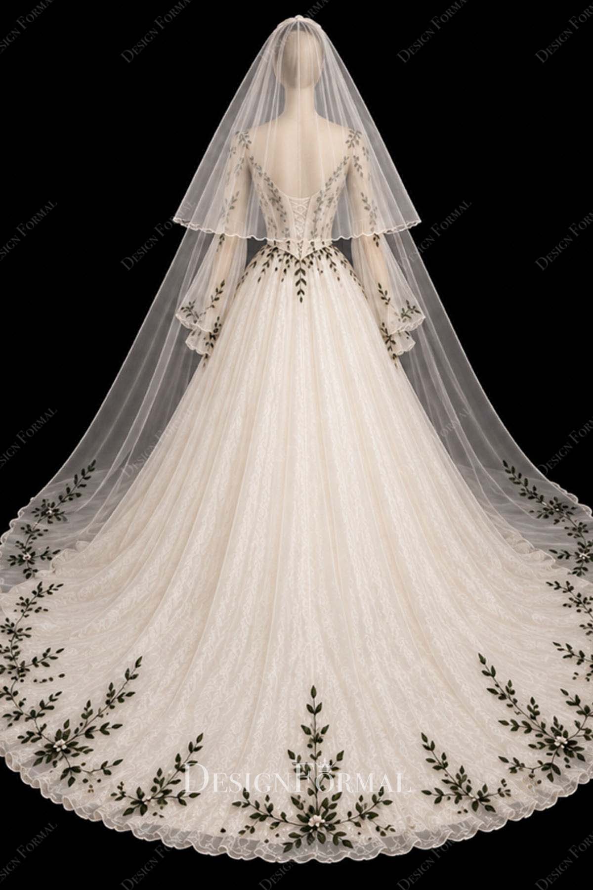 white illusion long sleeve wedding ballgown