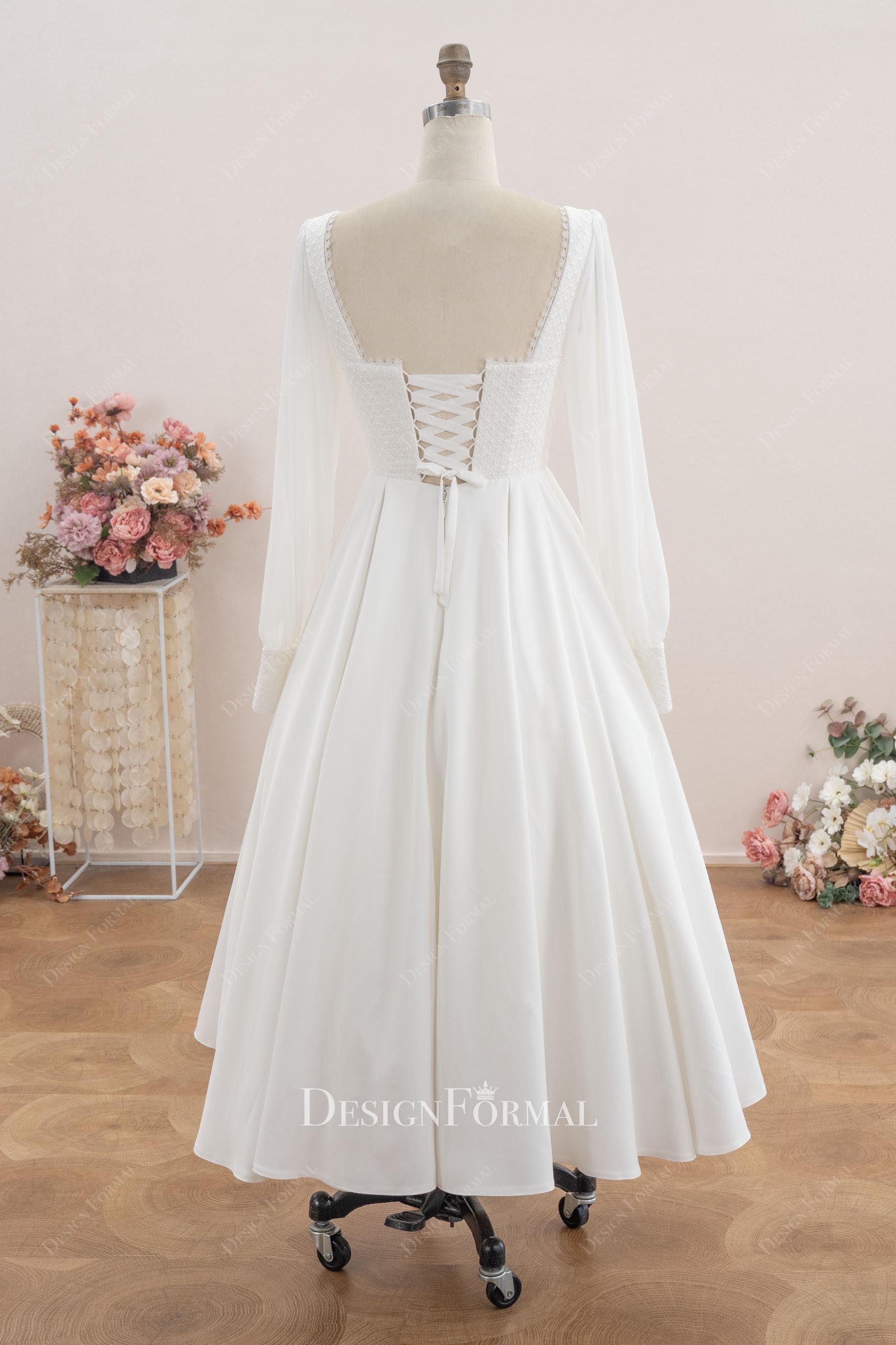 white lace up back wedding dress