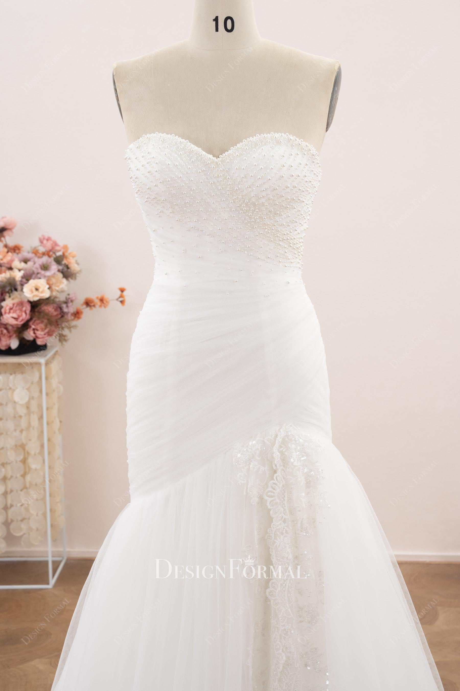 white pleated tulle wedding dress