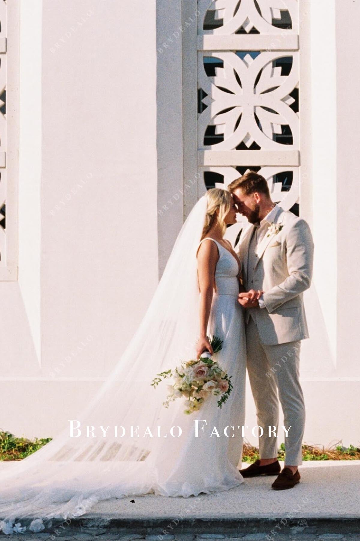 white plunging neck wedding dress